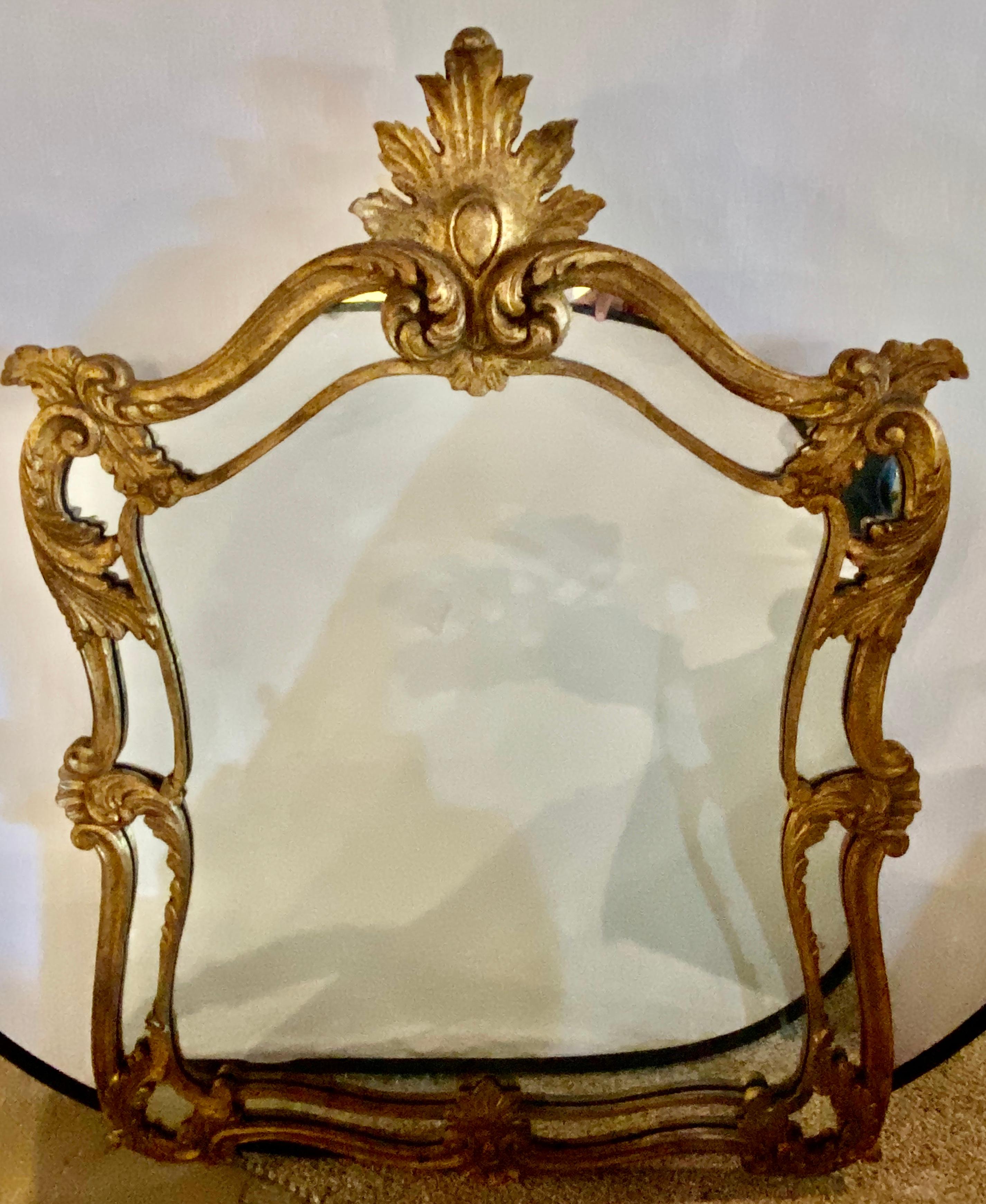 French neoclassical giltwood wall pier, wall or console mirror. A large and impressive carved wall mirror.


1XX.