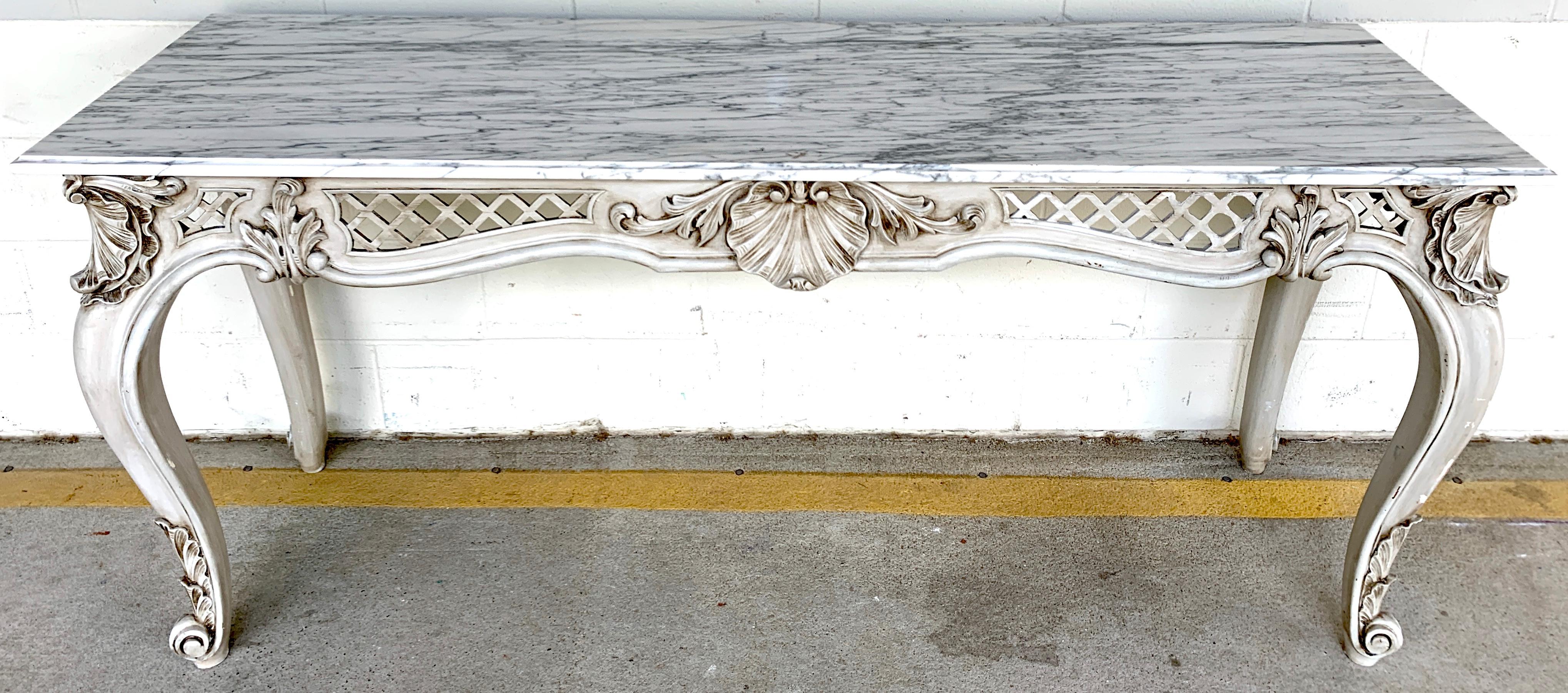 French neoclassical grey painted marble-top console table, of rectangular form with beautiful Carrera marble top, raised on a pierced shell carved scroll leg base.