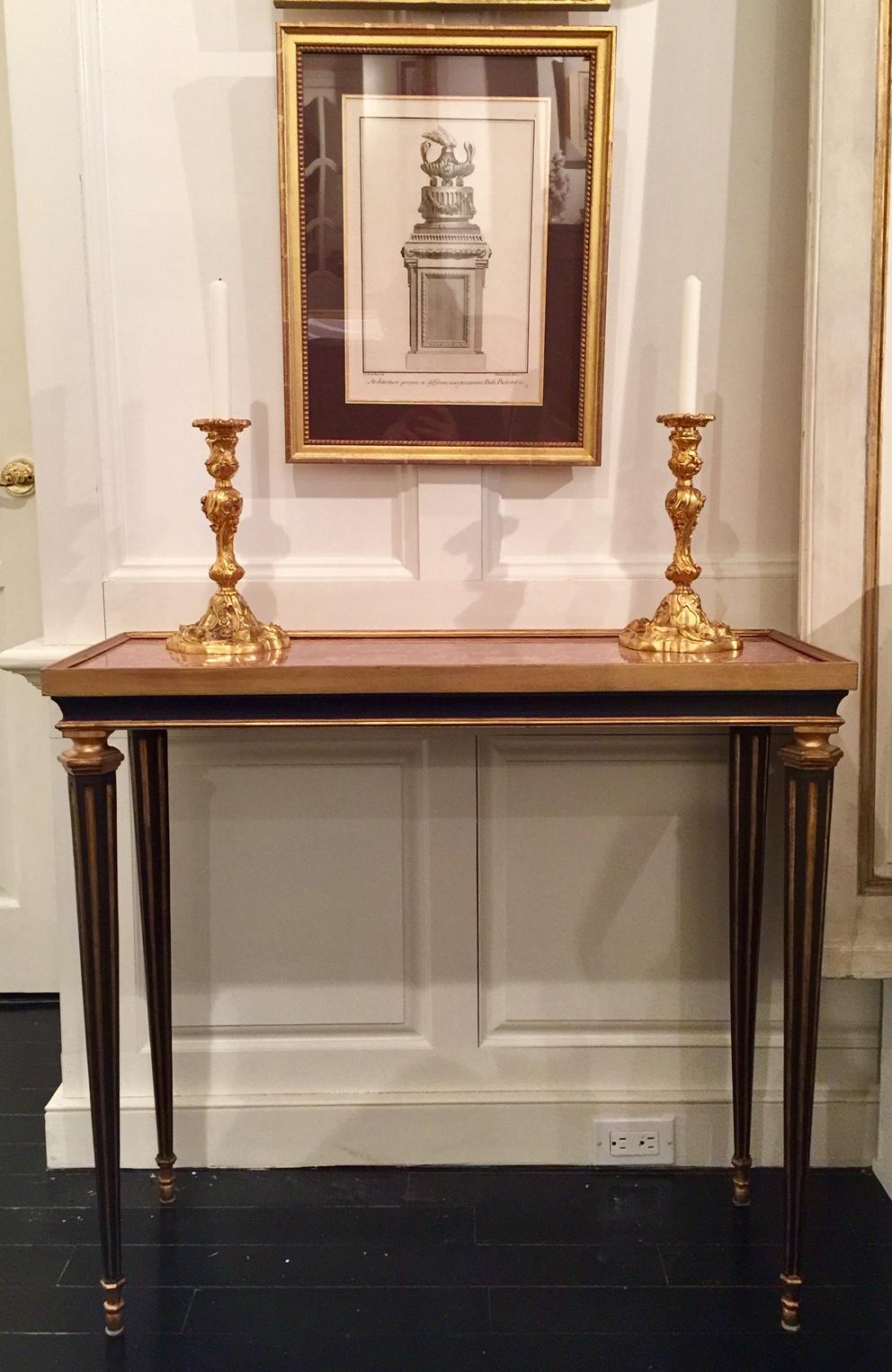French Louis XVI style ebonized and giltwood occasional table in the manner of Adam Weisweiler, made by Massant. This table d'appoint is typical of his small refined pieces, with fine lines and delicate legs. The beautiful red marble top is framed