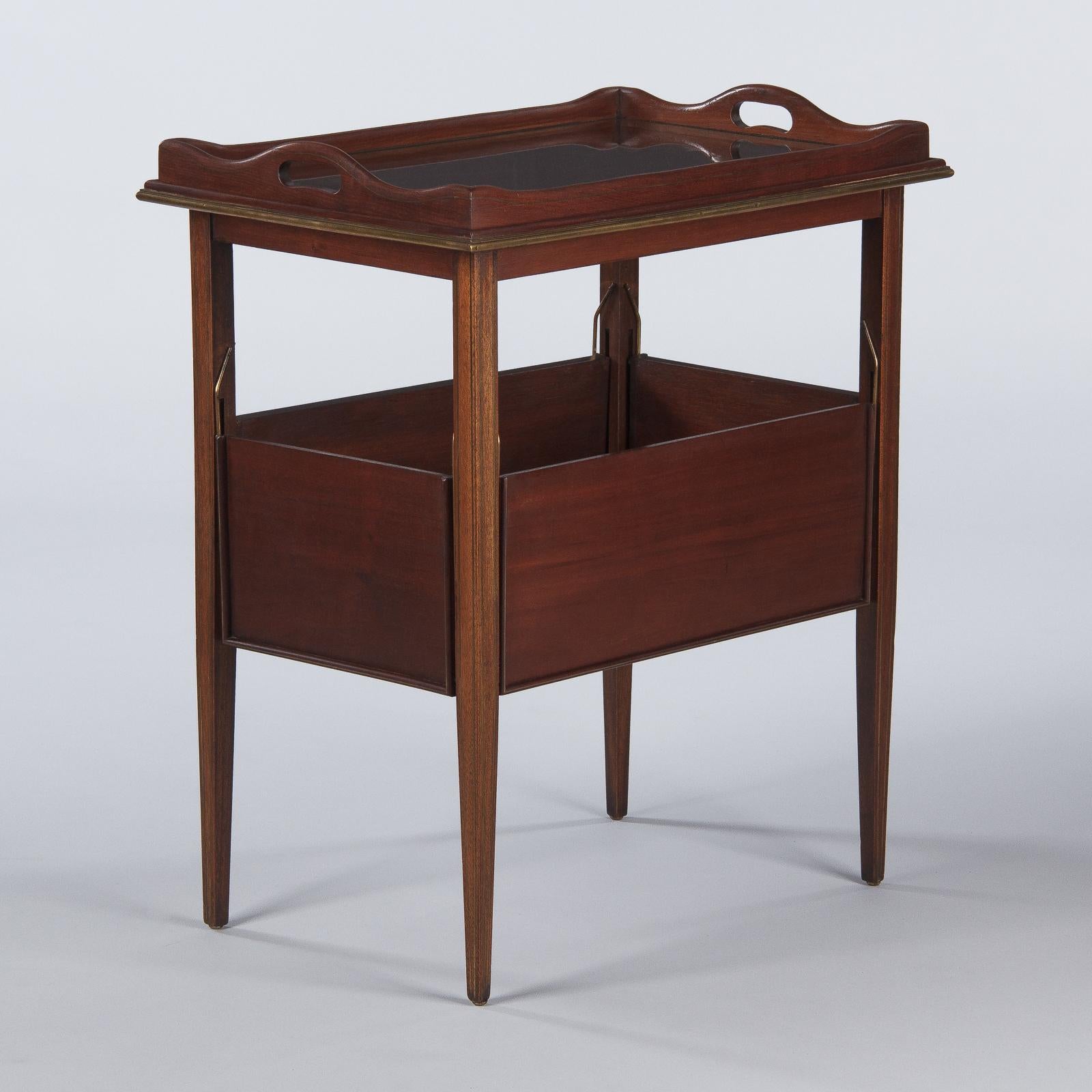 A vintage neoclassical convertible mahogany and rosewood serving table, French, circa 1920. Square tapered legs in mahogany, rosewood tabletop, shelves and tray, all with delicate bands of brass inlay for subtle decoration. The removable tray has