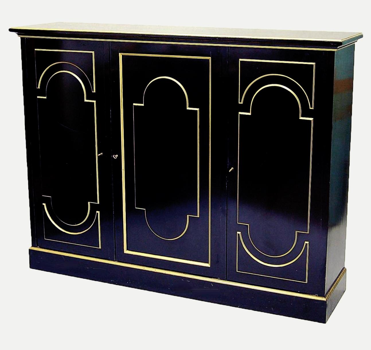 This luxurious cabinet is signed by neoclassical designer Maurice Hirsch. Typical of the designer, the piece was inspired by the 19th century, albeit with a contemporary twist. Rich, black wood makes up the body of the cabinet, and it’s been