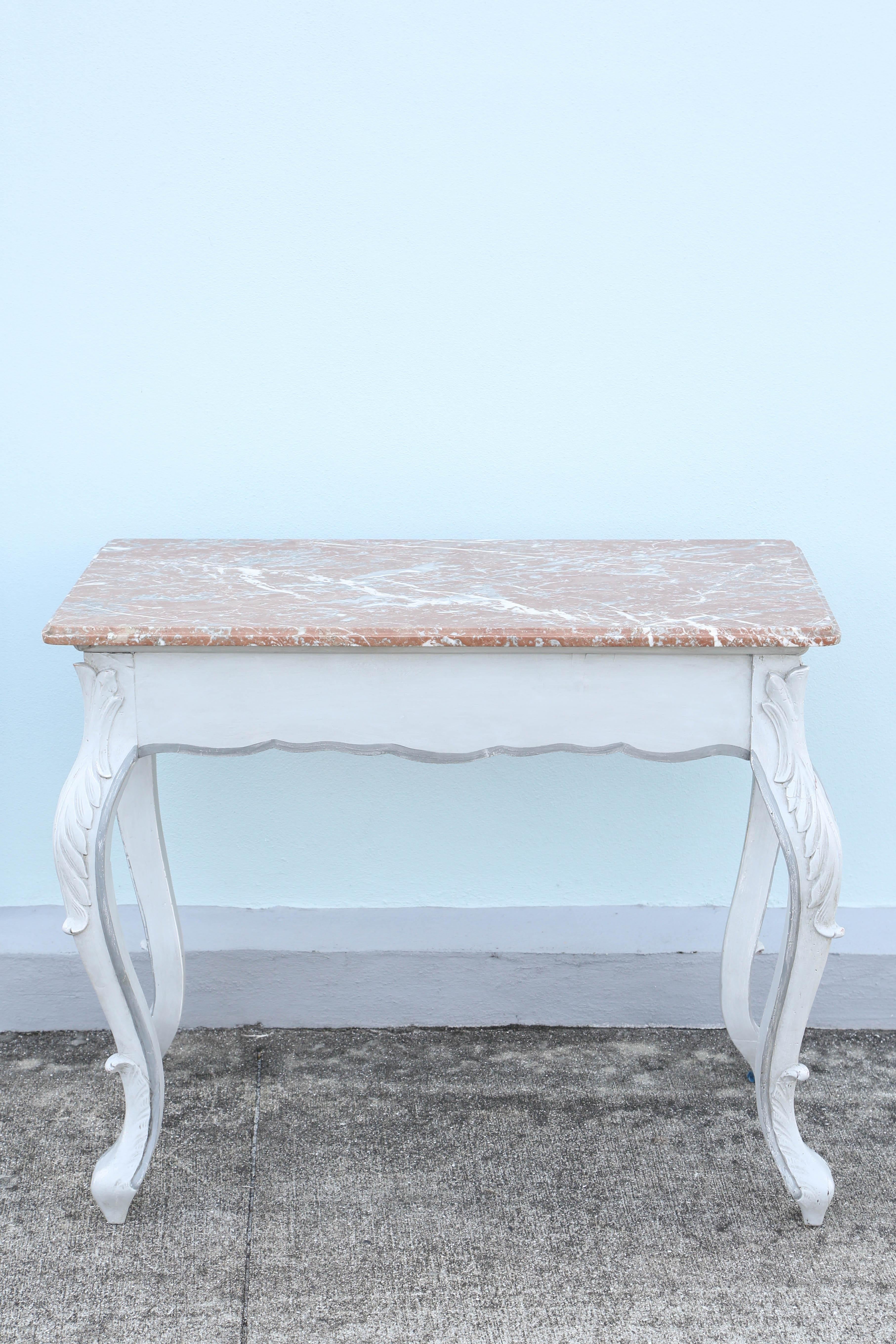 Painted French neoclassical writing table with single drawer, marble top and cabriole legs.