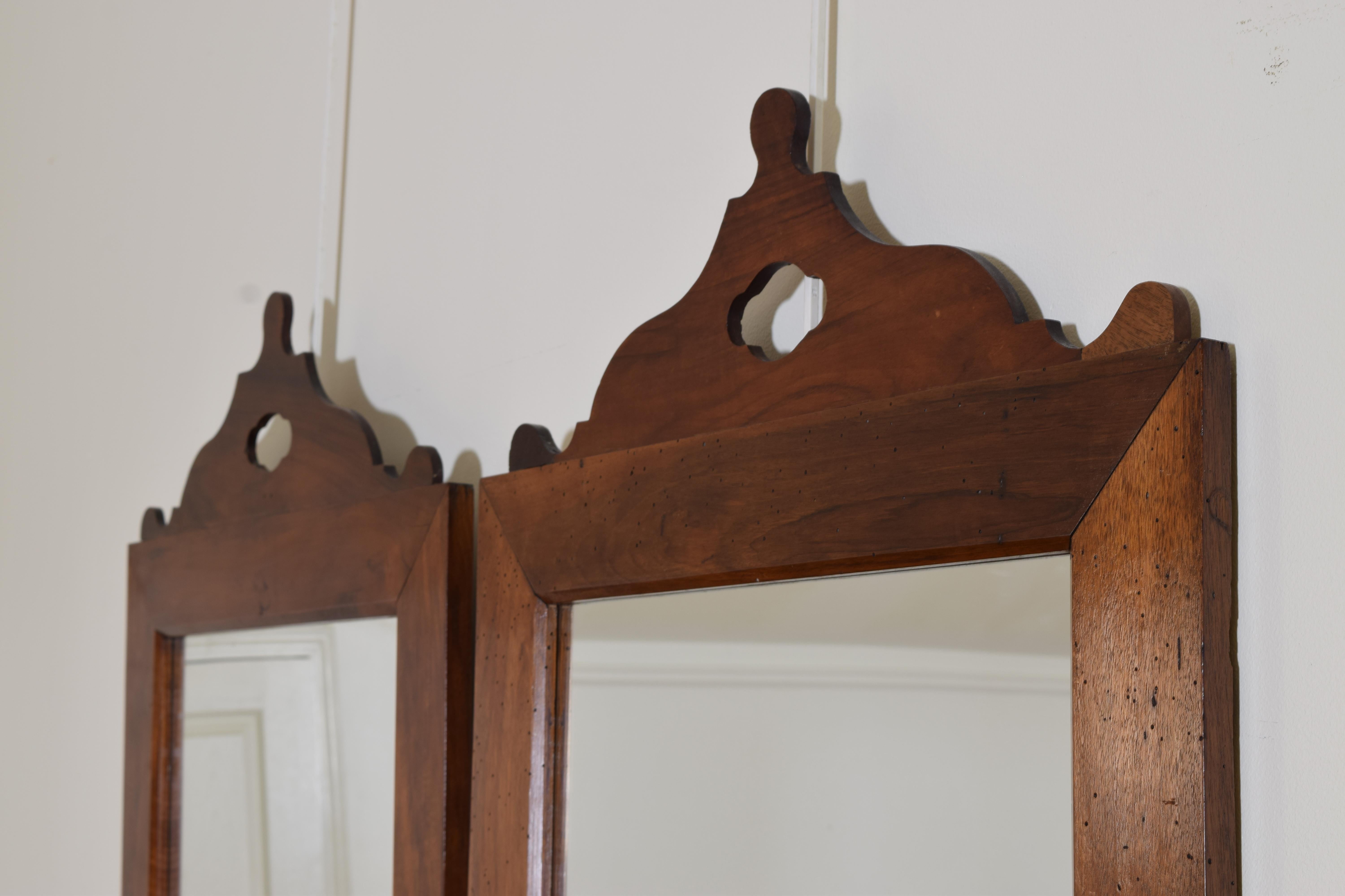 Mid-19th Century French Neoclassical Period Pair Shaped Walnut Mirrors, 2nd quarter 19th century For Sale