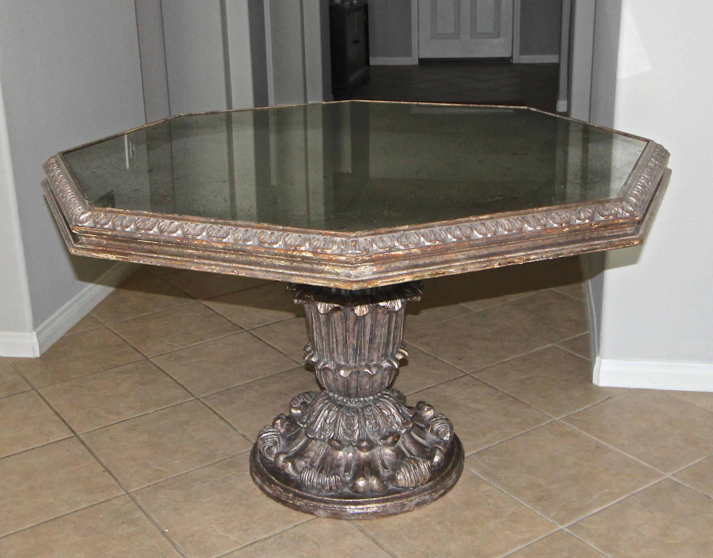Beautiful French neoclassical style silver giltwood hexagon centre or center table with inset antique mirror glass top. The table is expertly made through out including a finely carved scrolled acanthus leaves base. The aged antiqued silver gesso