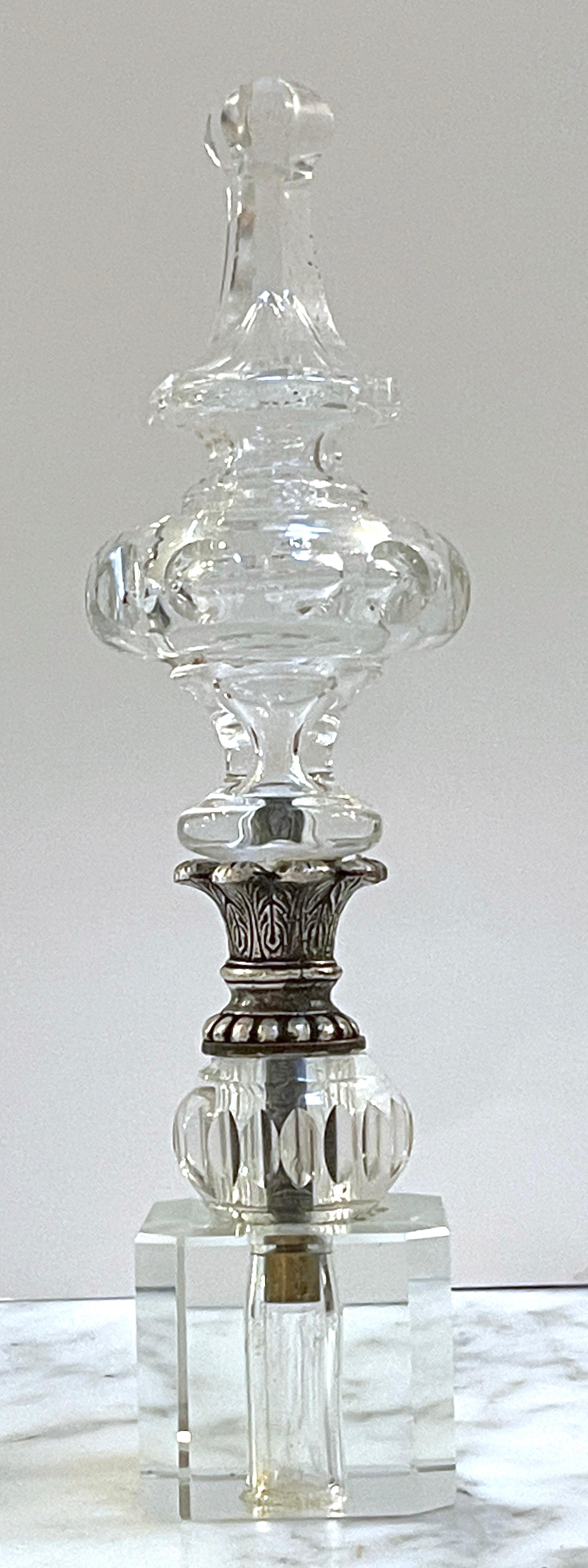 French Neoclassical Silverplated Bronze Mounted Crystal Newel Post 

A stunning French Neoclassical Silverplated Bronze Mounted Crystal Newel Post, a work that combines elegance and craftsmanship. This unique piece features a beautifully shaped