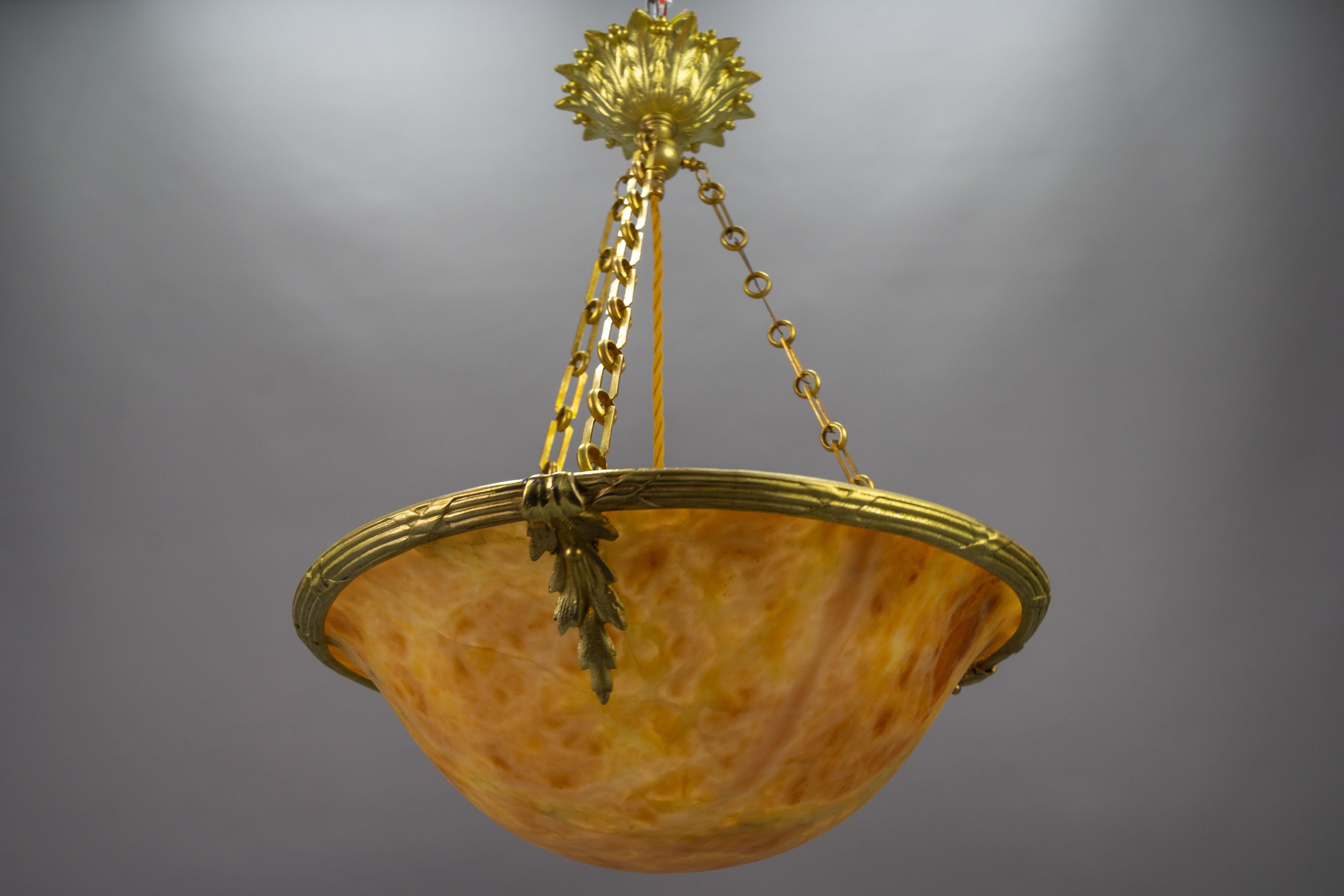 Neoclassical French Amber Color Alabaster and Bronze Pendant Chandelier, circa 1920 For Sale