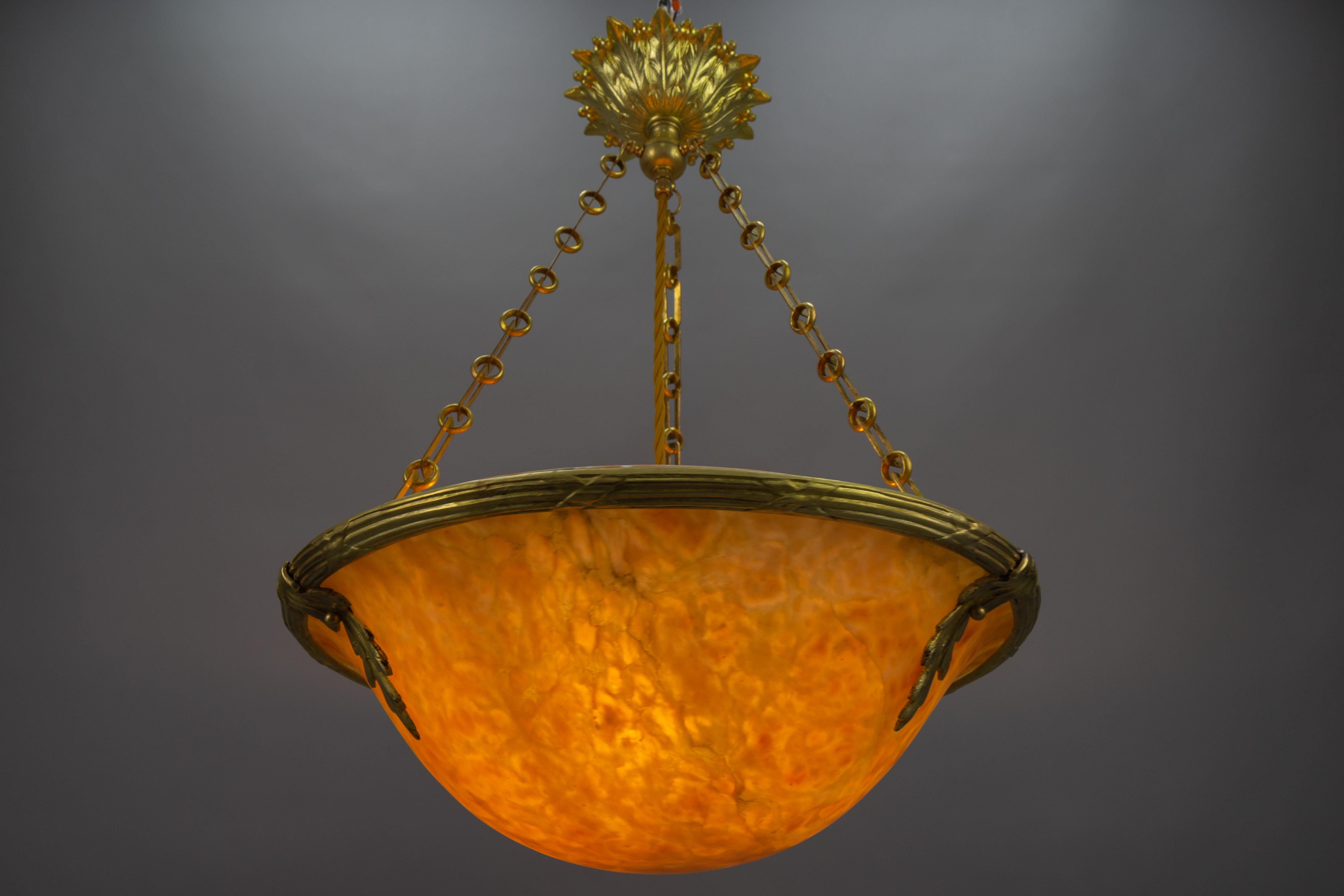 Early 20th Century French Amber Color Alabaster and Bronze Pendant Chandelier, circa 1920 For Sale