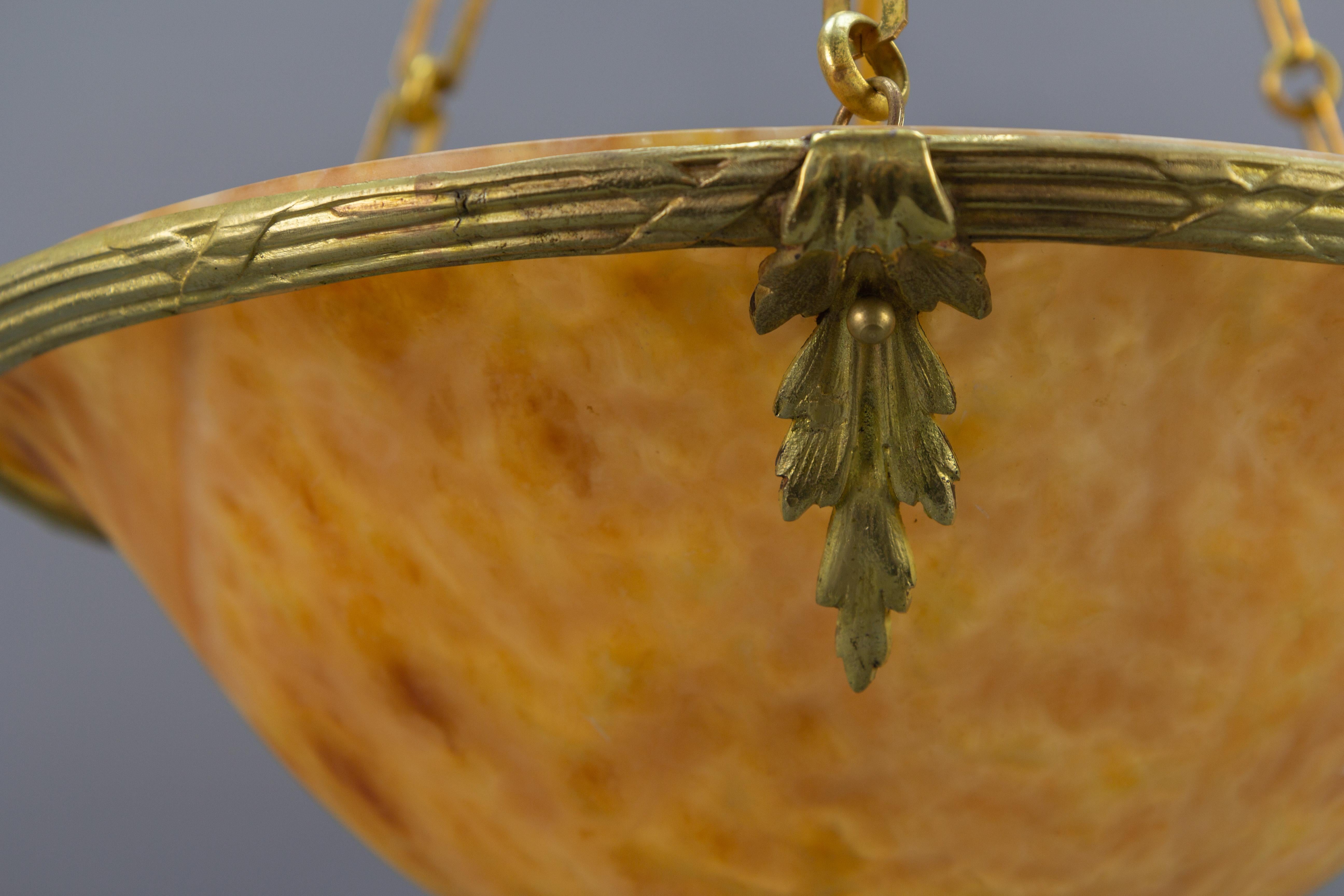 French Amber Color Alabaster and Bronze Pendant Chandelier, circa 1920 For Sale 3