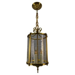 Farol colgante redondo de latón y cristal transparente, estilo neoclásico francés, años 20