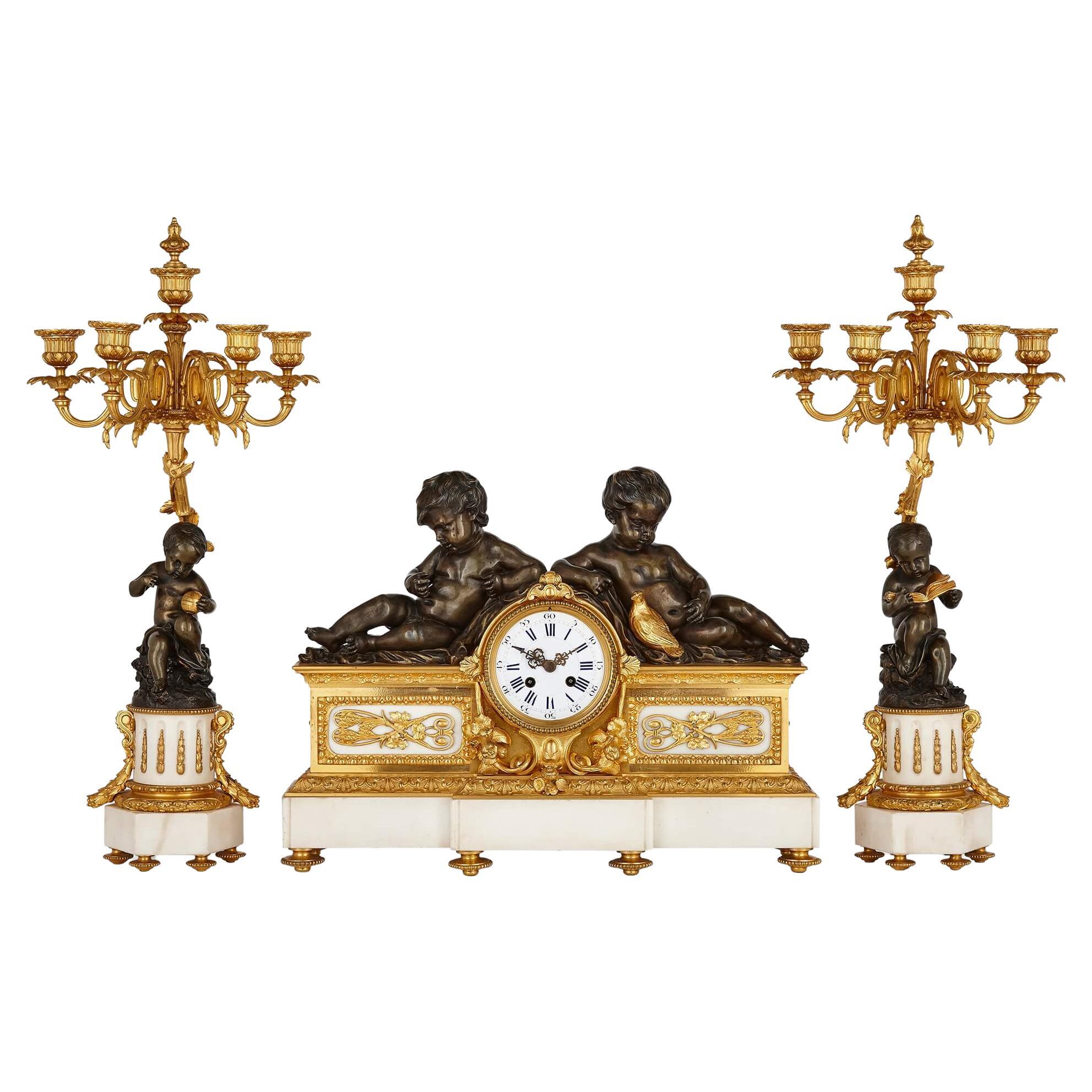 French Neoclassical Style Bronze and Marble Three-Piece Clock Set