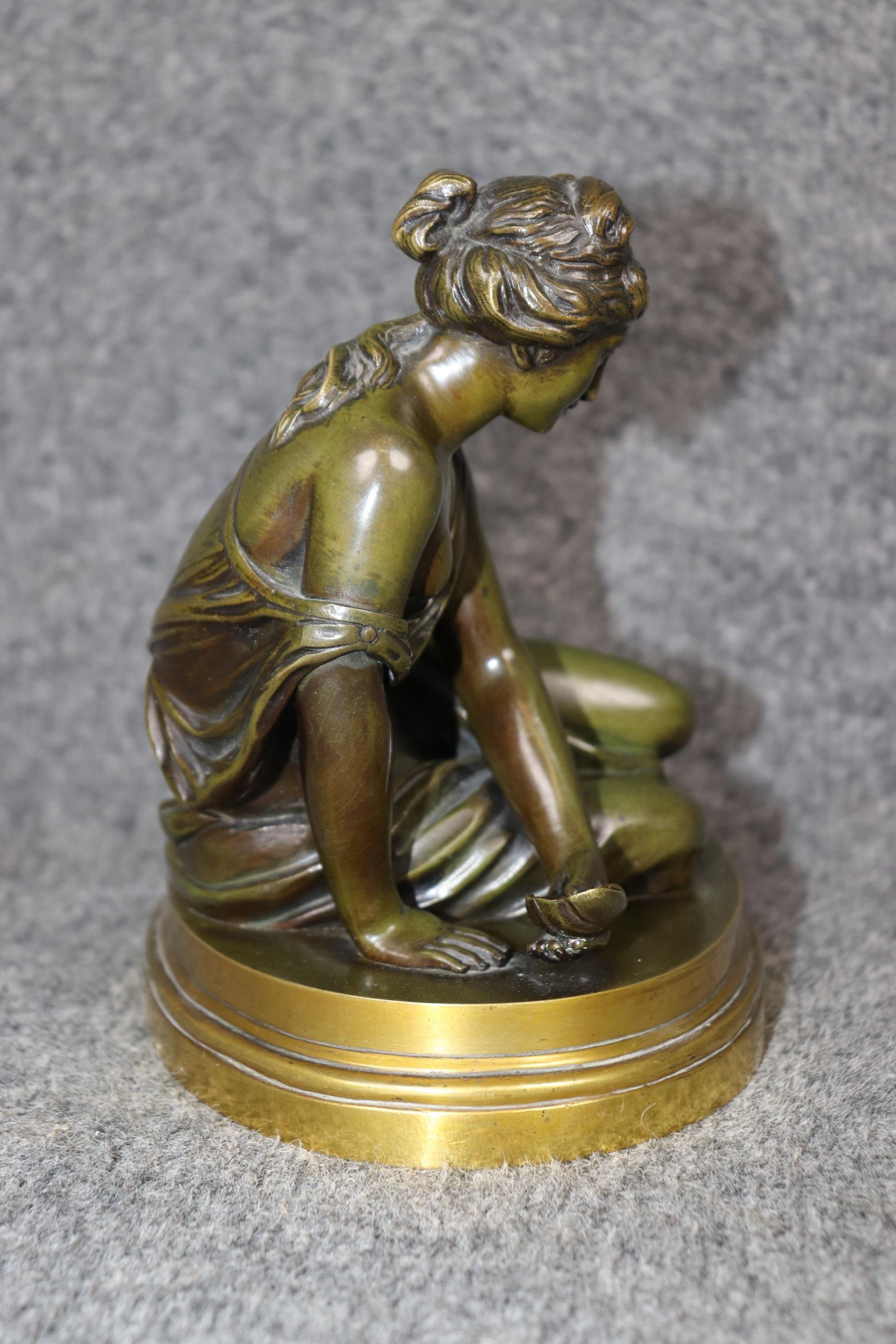Dimensions - H: 7in W: 8in D: 5 1/2in 

This antique French Neoclassical figural bronze sculpture of a maiden, after Samson, is an incredible example of 20th century French decor! If you look at the photos provided, you can see the attention to