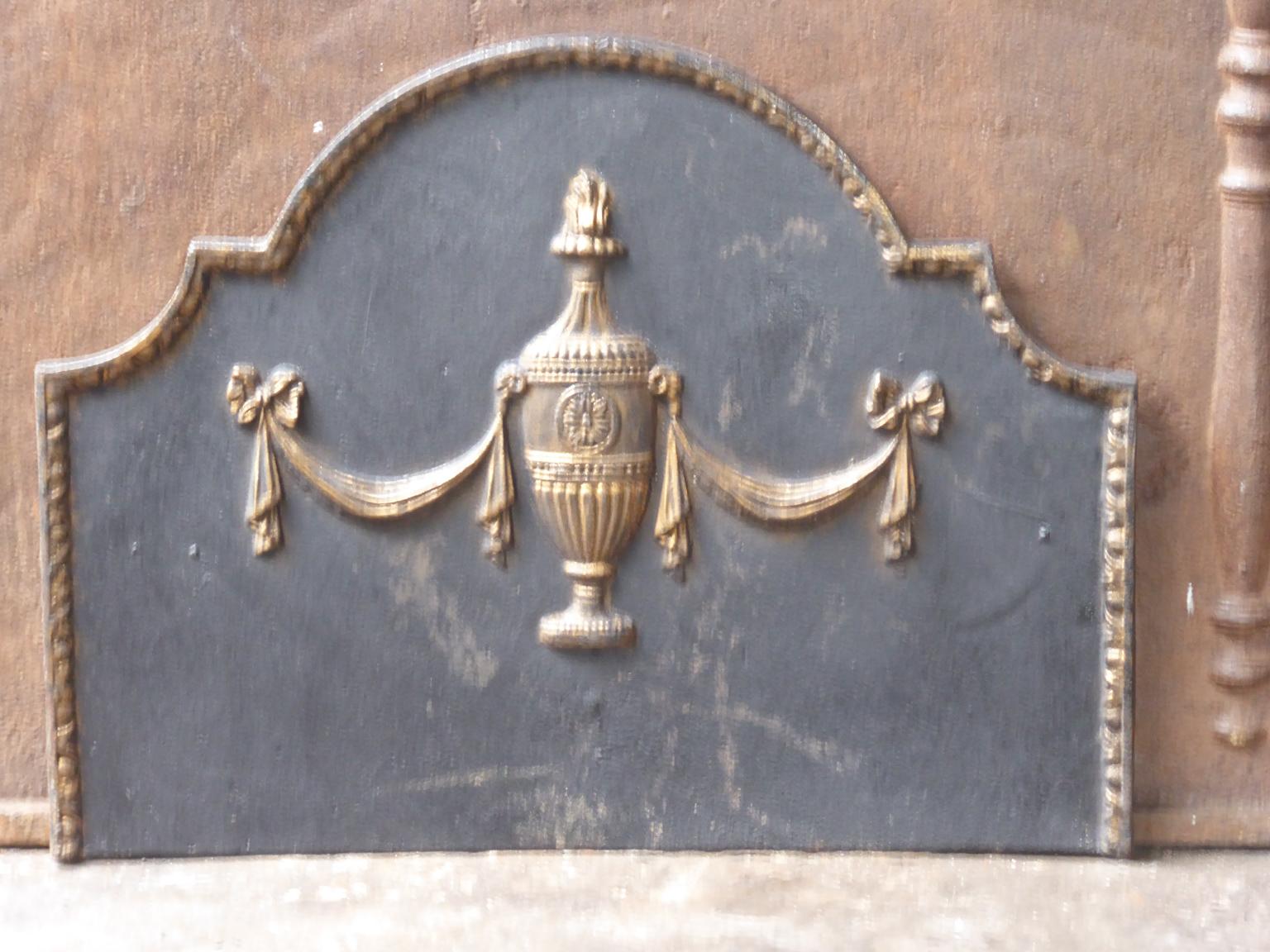 Early 20th century French neoclassical style fireback. The fireback is made of cast iron. It is in a good condition, without cracks.







 