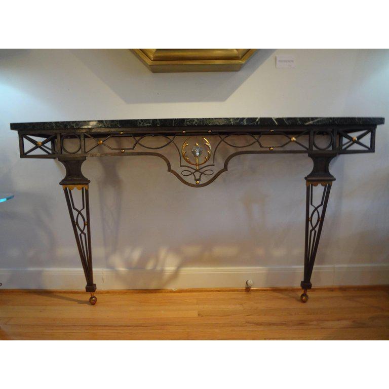 French Neoclassical style iron console table.
Outstanding large French neoclassical style wrought iron console table inspired by Gilbert Poillerat, 1940s.
This stunning large French console is wall-mounted and has great proportions. This versatile