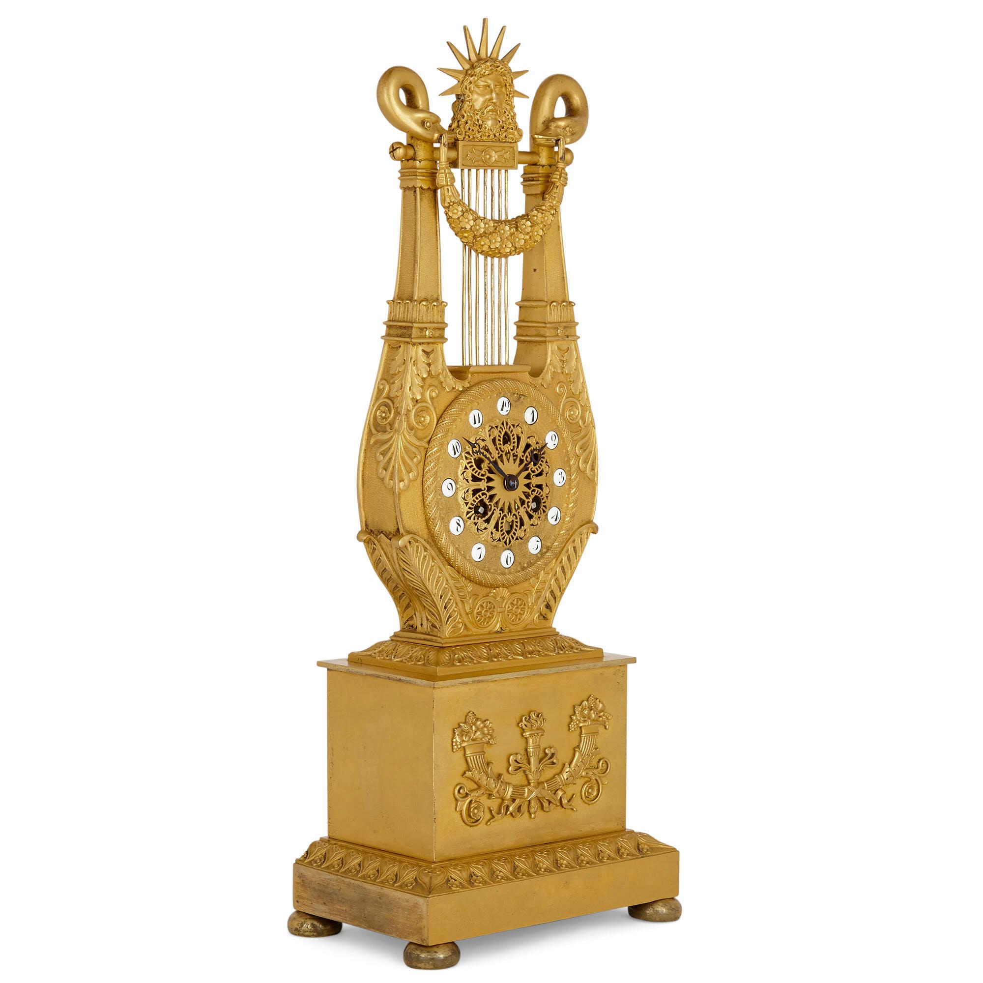 French neoclassical style lyre-form gilt bronze clock
French, 19th century
Measures: Height 50cm, width 19cm, depth 13cm

This wonderful mantel clock, crafted entirely from gilt bronze, is a magnificent example of the Louis XVI style. The clock