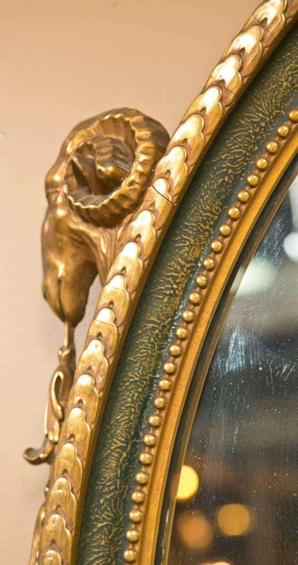 French Neoclassical Style Oval Mirror With Rams Head Design Paint And Gilded 8