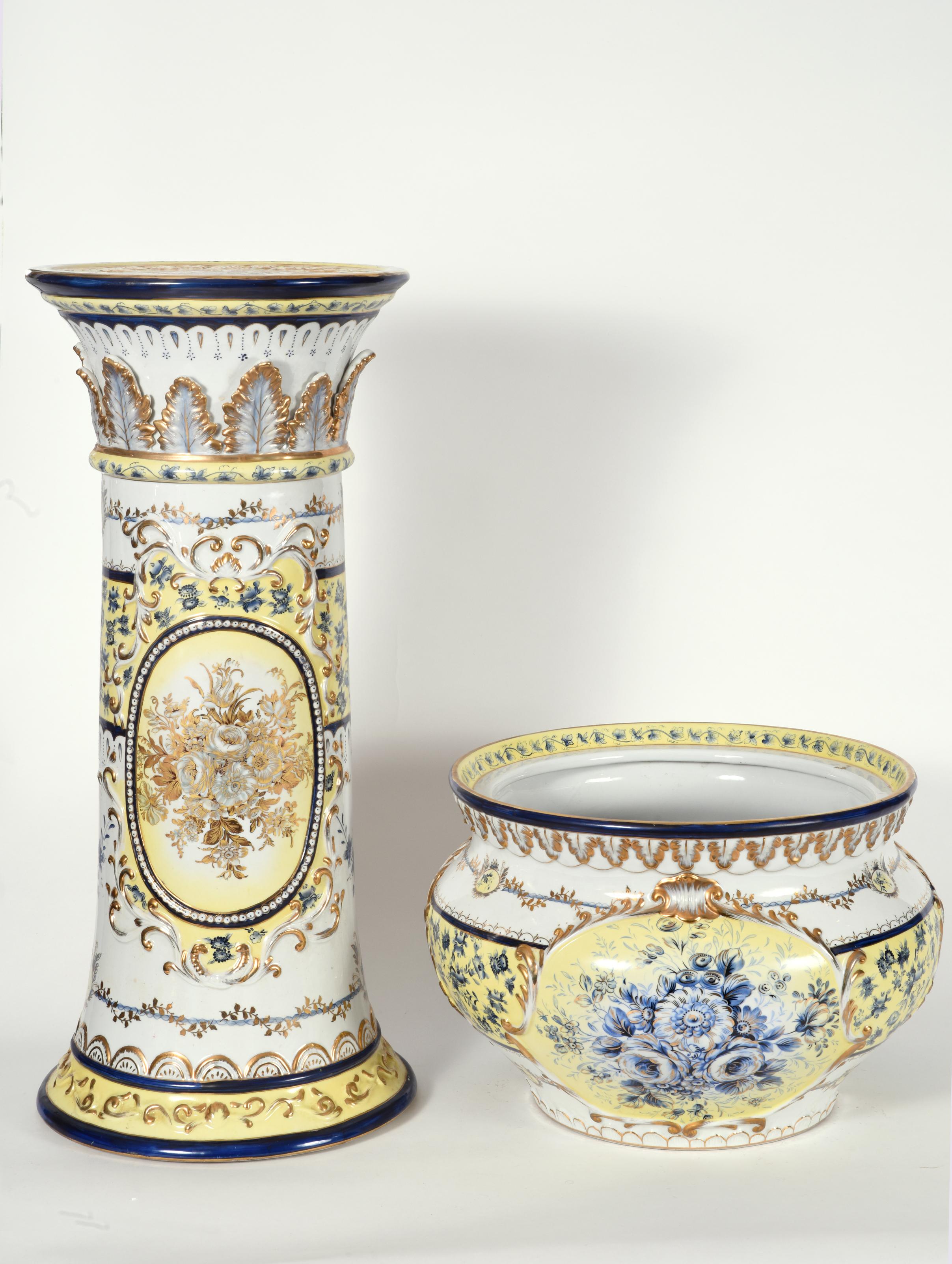 French neoclassical style porcelain plant stand with cachepot decorative set. The pieces are featured a gilt floral and acanthus leaf design details. The pieces are in excellent vintage condition. Together the stand with cachepot measure 36.5 inches