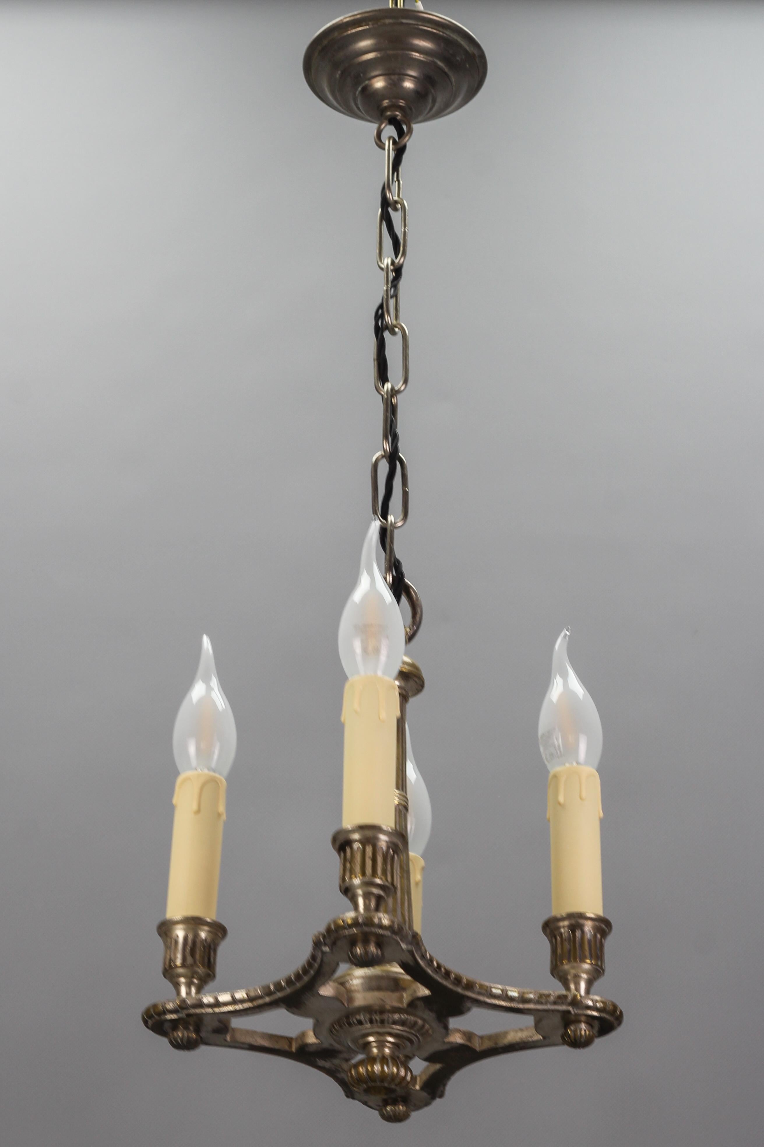 Metal French Neoclassical Style Silver Color Brass Four-Light Chandelier, circa 1920 For Sale