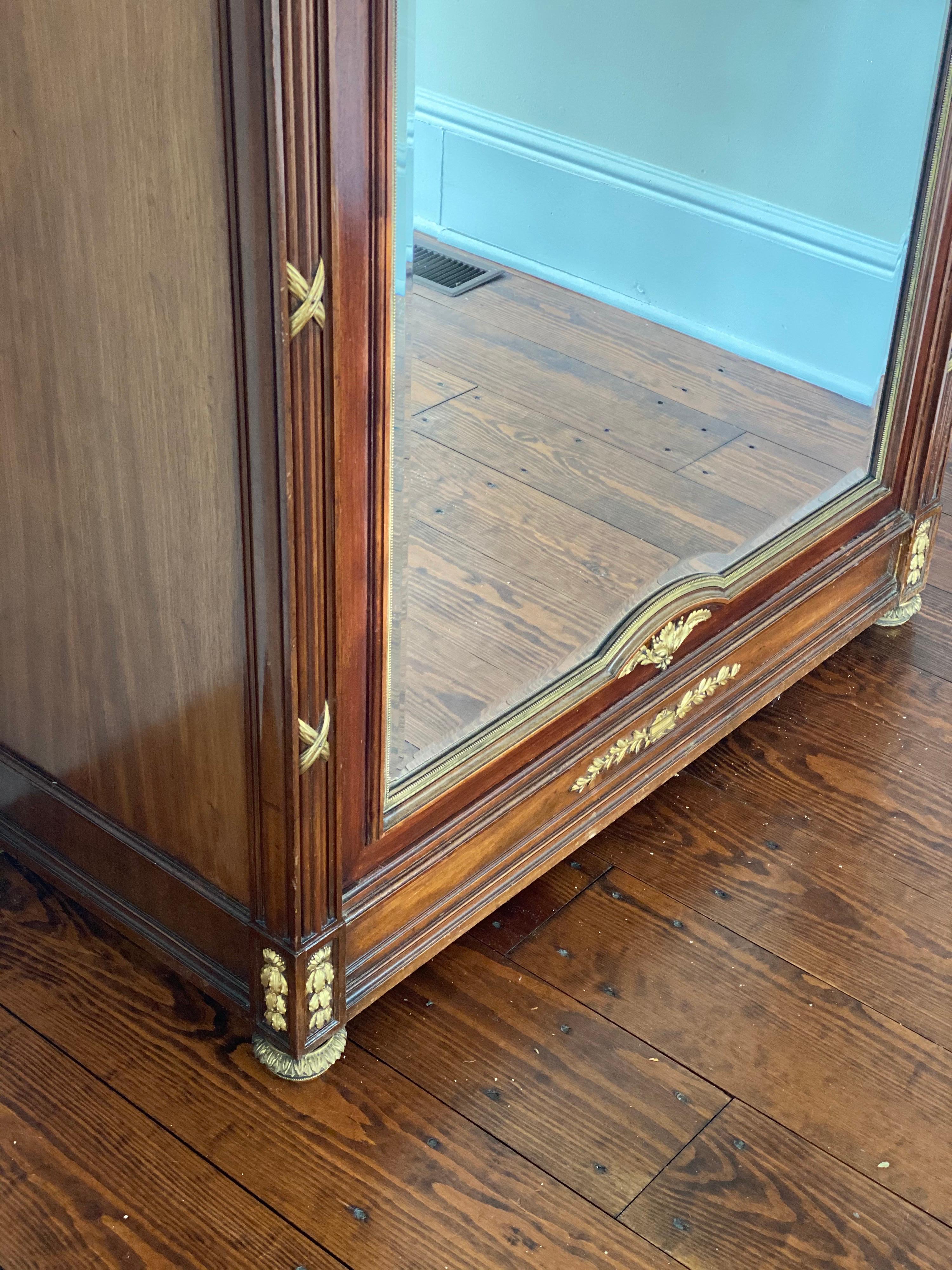 tall mirrored armoire