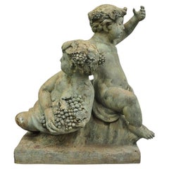 Escultura grande de bronce verdigris de estilo neoclásico francés Baco Querubines Putti