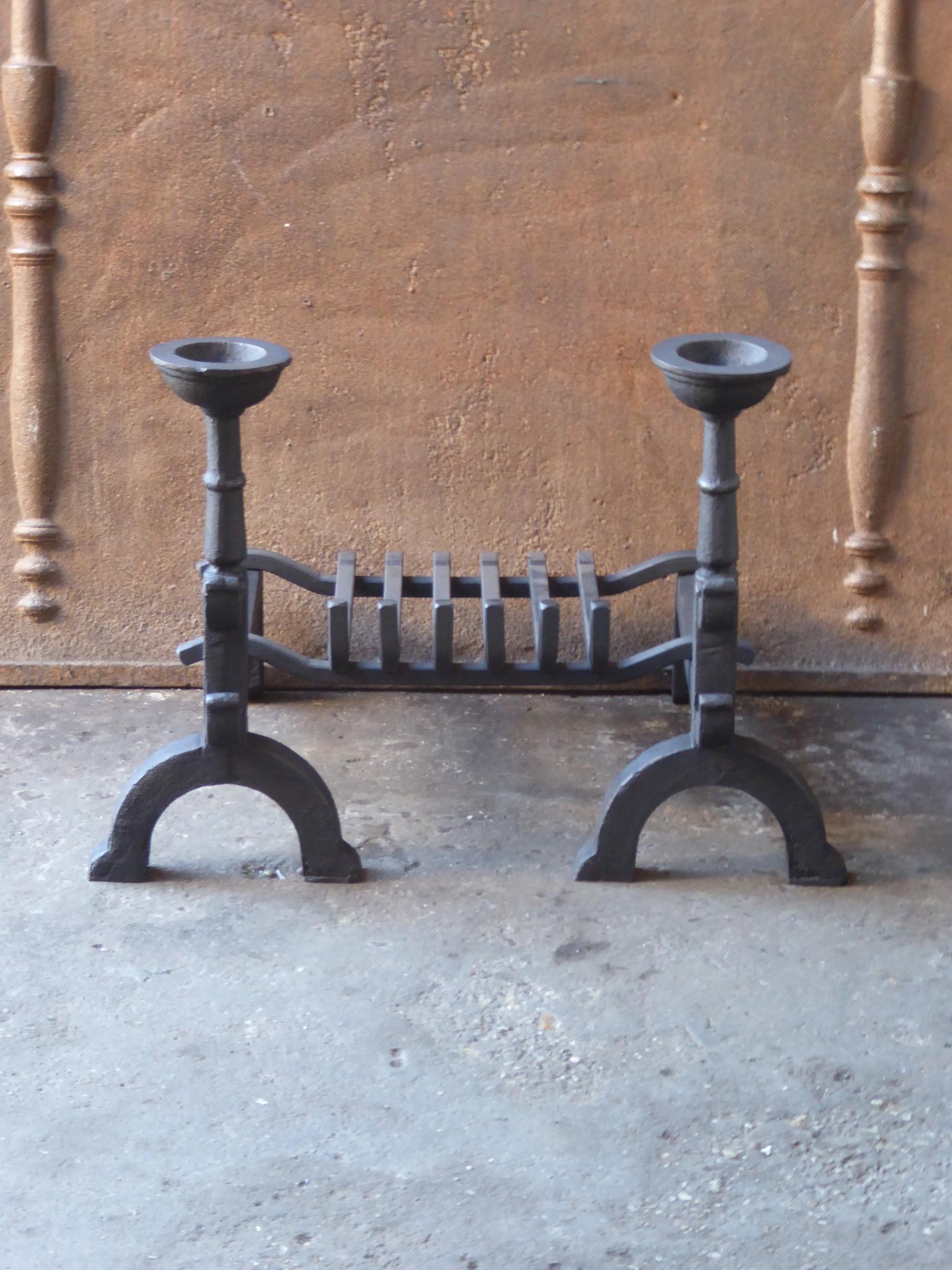 20th century French Neo-gothic fireplace basket - fire basket made of wrought iron and cast iron. The basket is in a good condition and is fully functional. The total width of the front of the fireplace grate is 60.0 cm or 23.6 inch.