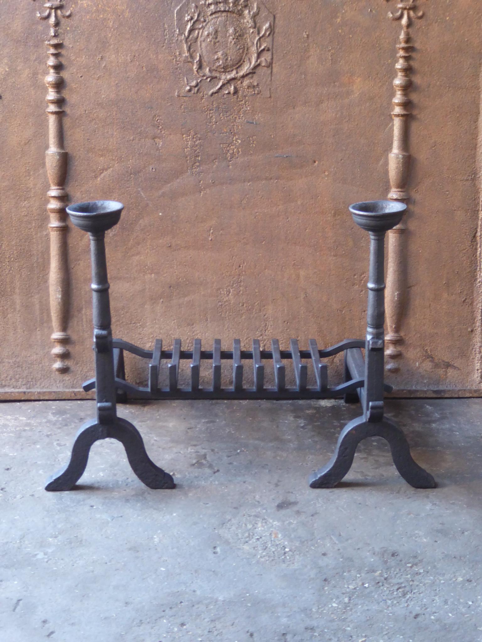 20th Century French Neo-gothic fireplace basket - fire basket made of wrought iron and cast iron. The basket is in a good condition and is fully functional. The total width of the front of the fireplace grate is 70.0 cm or 27.6 inch.