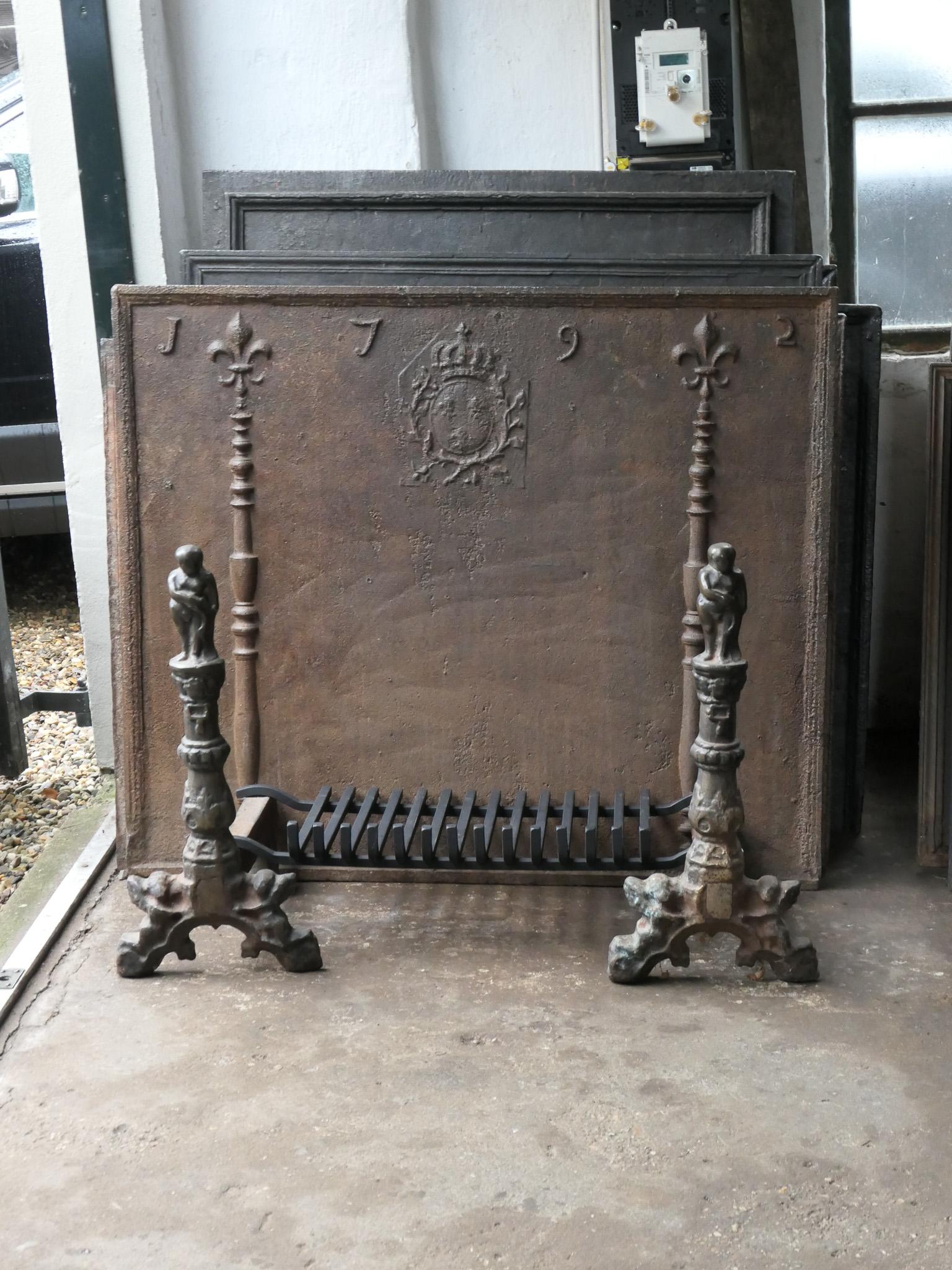 20th century French Neo-gothic fireplace basket - fire basket made of wrought iron and cast iron. The basket is in a good condition and is fully functional. The total width of the front of the fireplace grate is 104 cm or 40.9 inch.