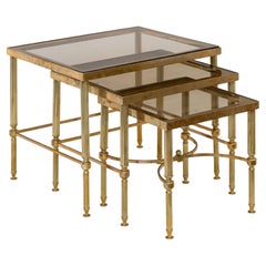 Mesas nido francesas de latón con cristal ahumado
