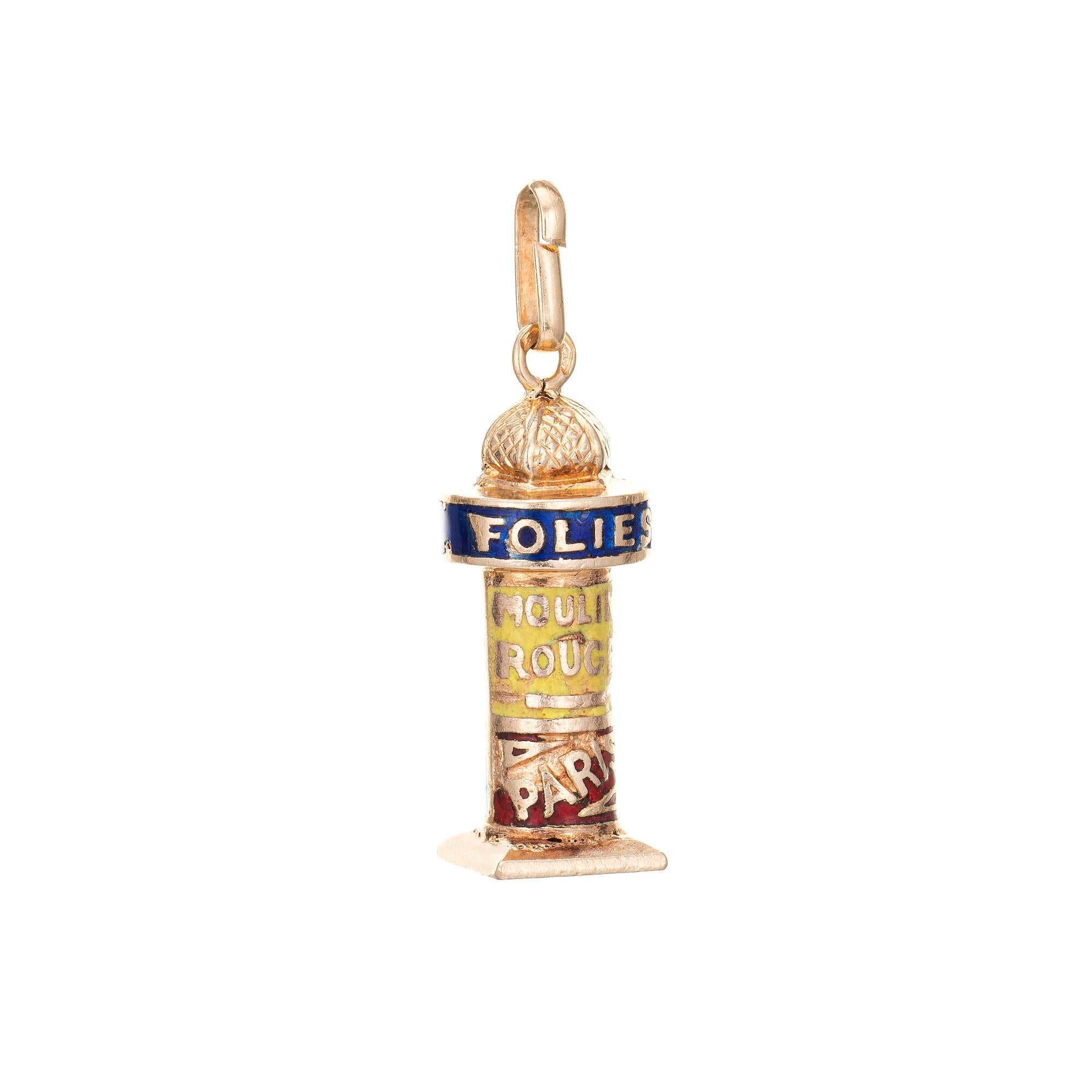 Finely detailed vintage French enamel kiosk charm crafted in 18k yellow gold.  

The colorful polychrome enamel charm is cylindrical in design with a textured domed top and square base. The charm highlights popular entertainment venues in Paris from