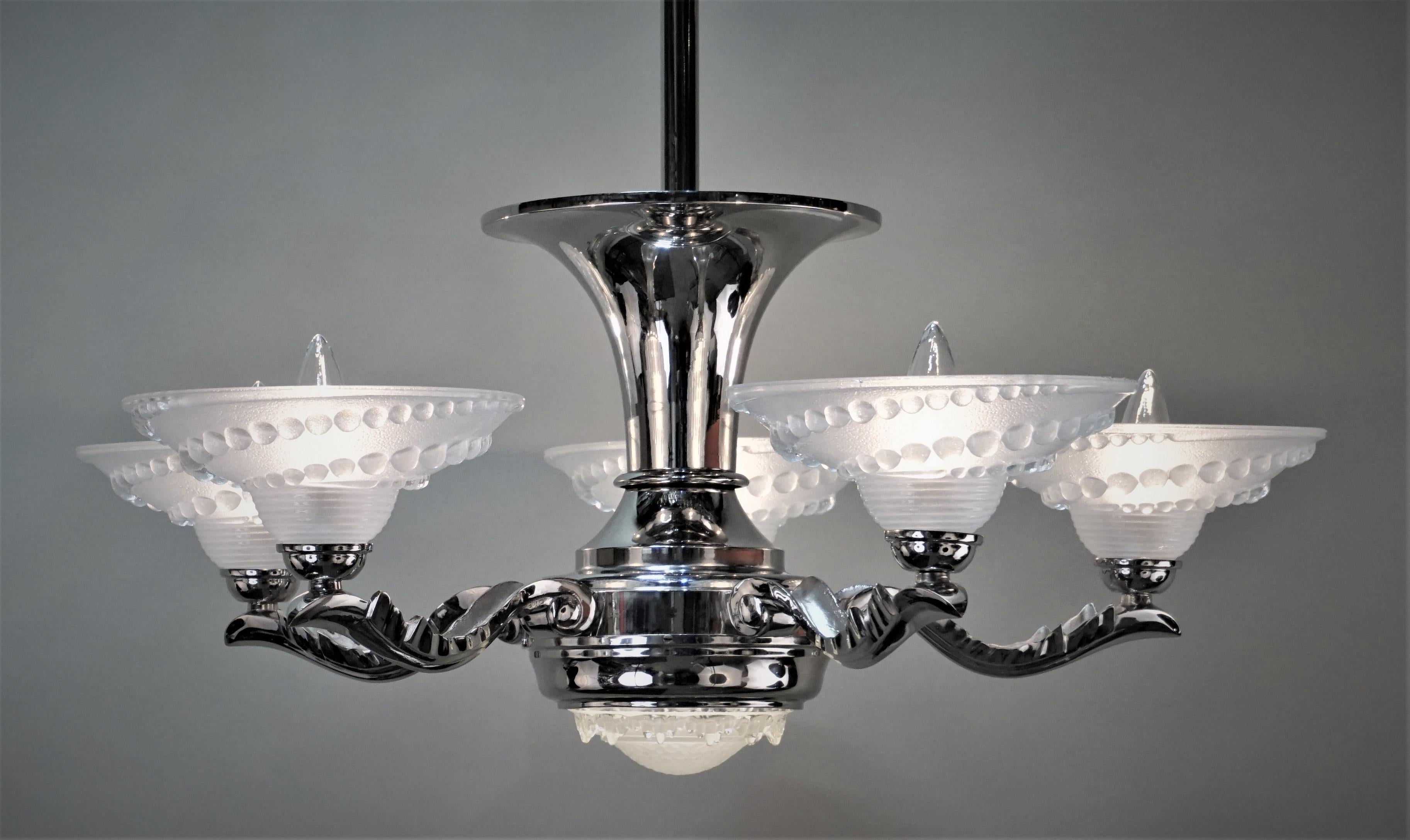 1930s polished nickel on bronze with six glass shades Art Deco chandelier.