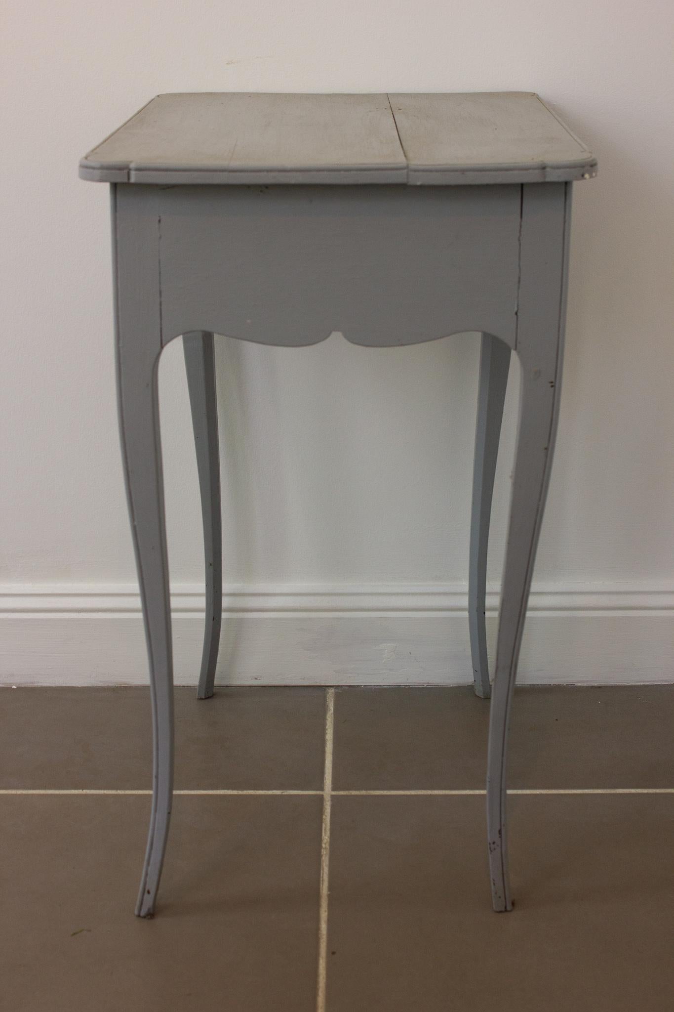 Vintage patina nightstand in gray, dating from the 1950s. This night table is in the Louis XV style, recognizable by its curved legs. The waist is carved in round, and dressed with 2 drawers in front.

Very beautiful

France
XXth century
Louis 15