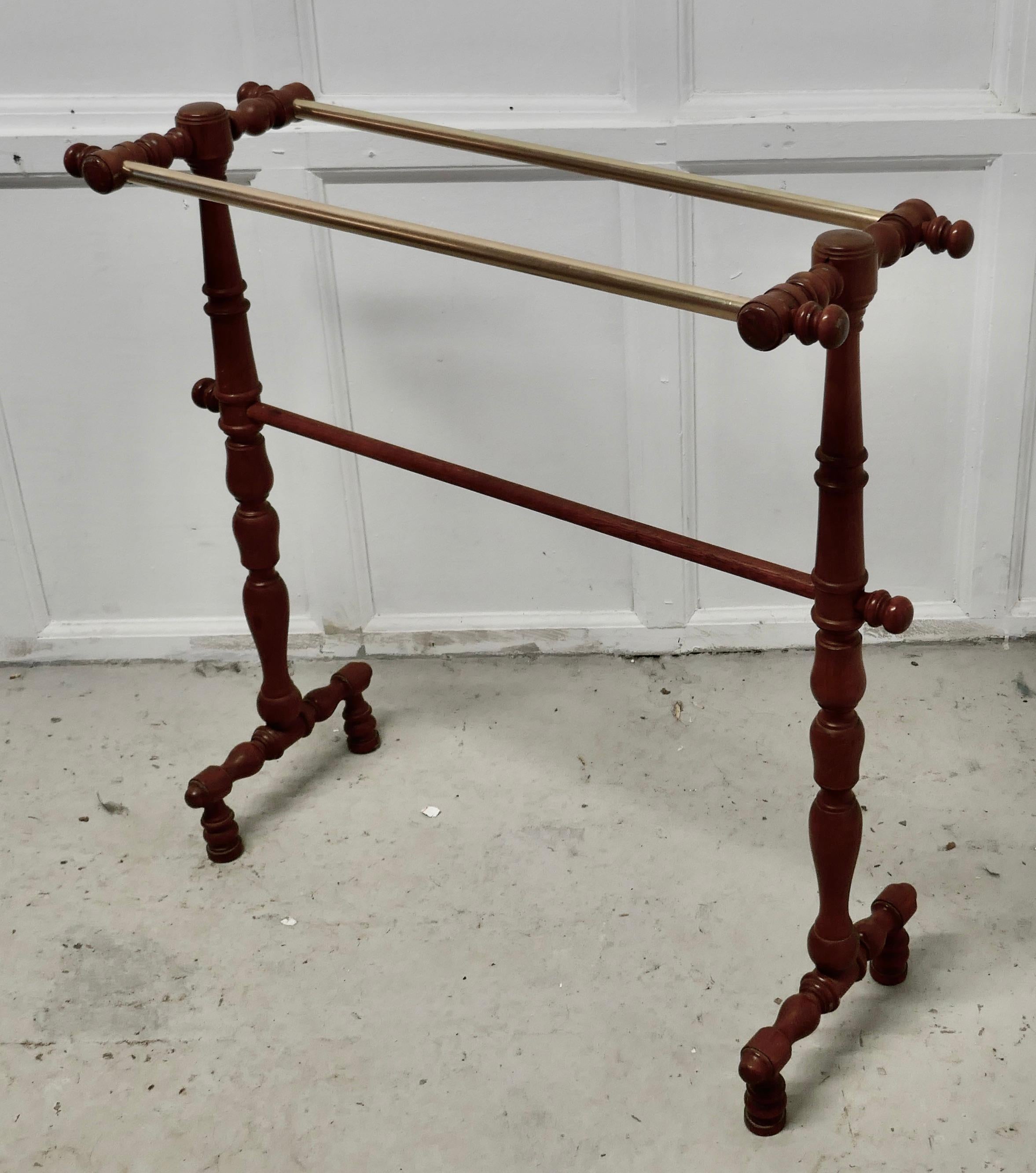 French oak and brass towel rail

This is a neat French piece, it has a double rail at the top in brass and a lower rail in oak as are the turned uprights 
The rail is in good condition and adds a touch of elegance to any bath room or dressing