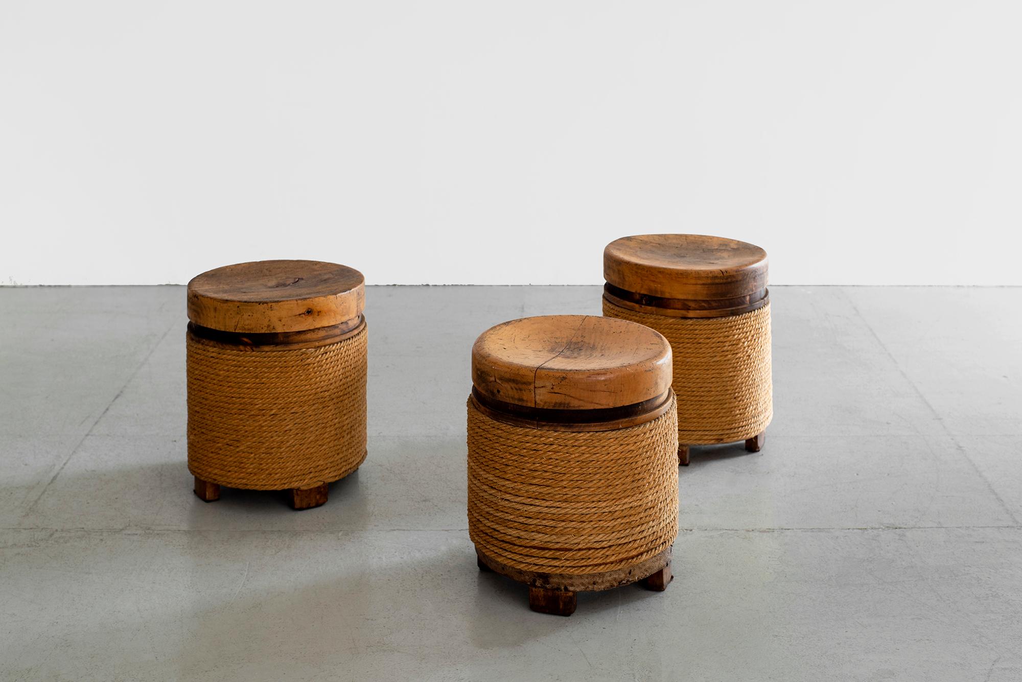Solid French oak stool with rope in the style of Audoux Minet
Wonderful patina to wood and grain 
Sits on legs off the floor 
Sold individually.