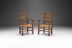 Fauteuils en chêne français avec assise en jonc tissé, France, années 1950