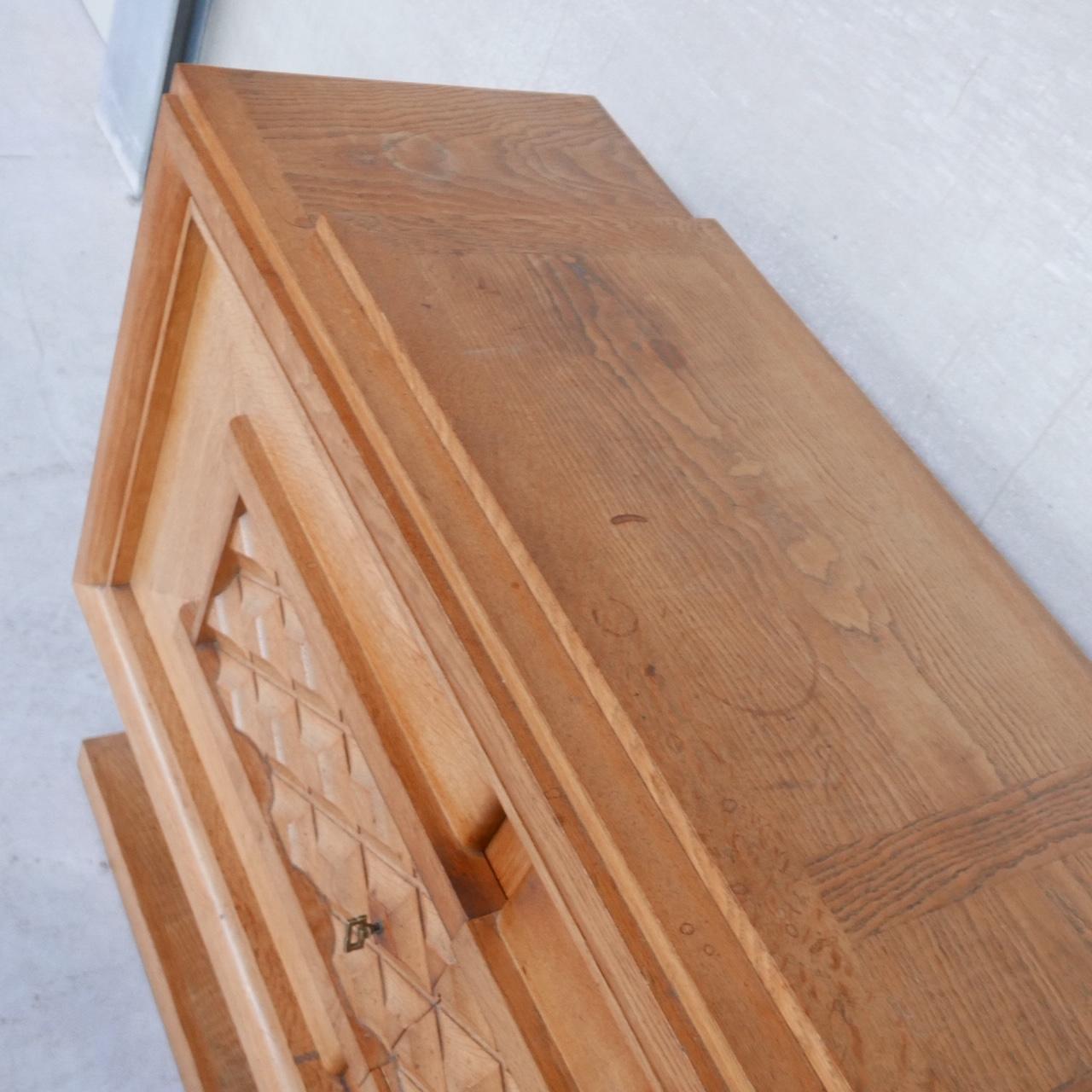 An exceptional oak credenza. 

France, c1940s. 

Likely by Charles Dudouyt or Gaston Poisson. 

One of the best models we have ever found. 

Remains in good vintage condition, some wear and aging commensurate with age. 

Location: Belgium