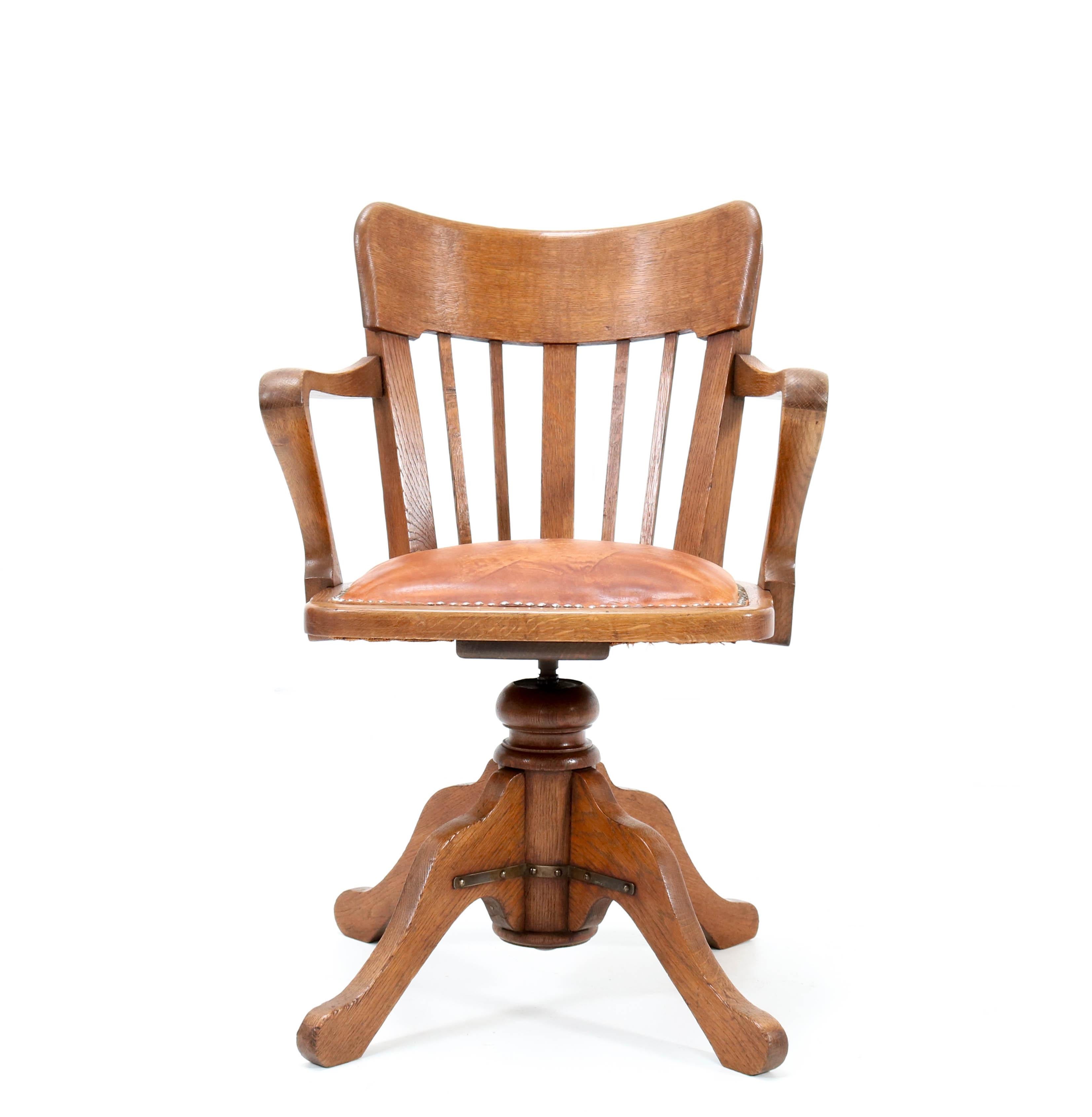Wonderful Art Nouveau swivel desk chair.
Striking French design from the 1900s.
Solid oak with leather seat.
Adjustable in height.
In very good condition with a beautiful patina.