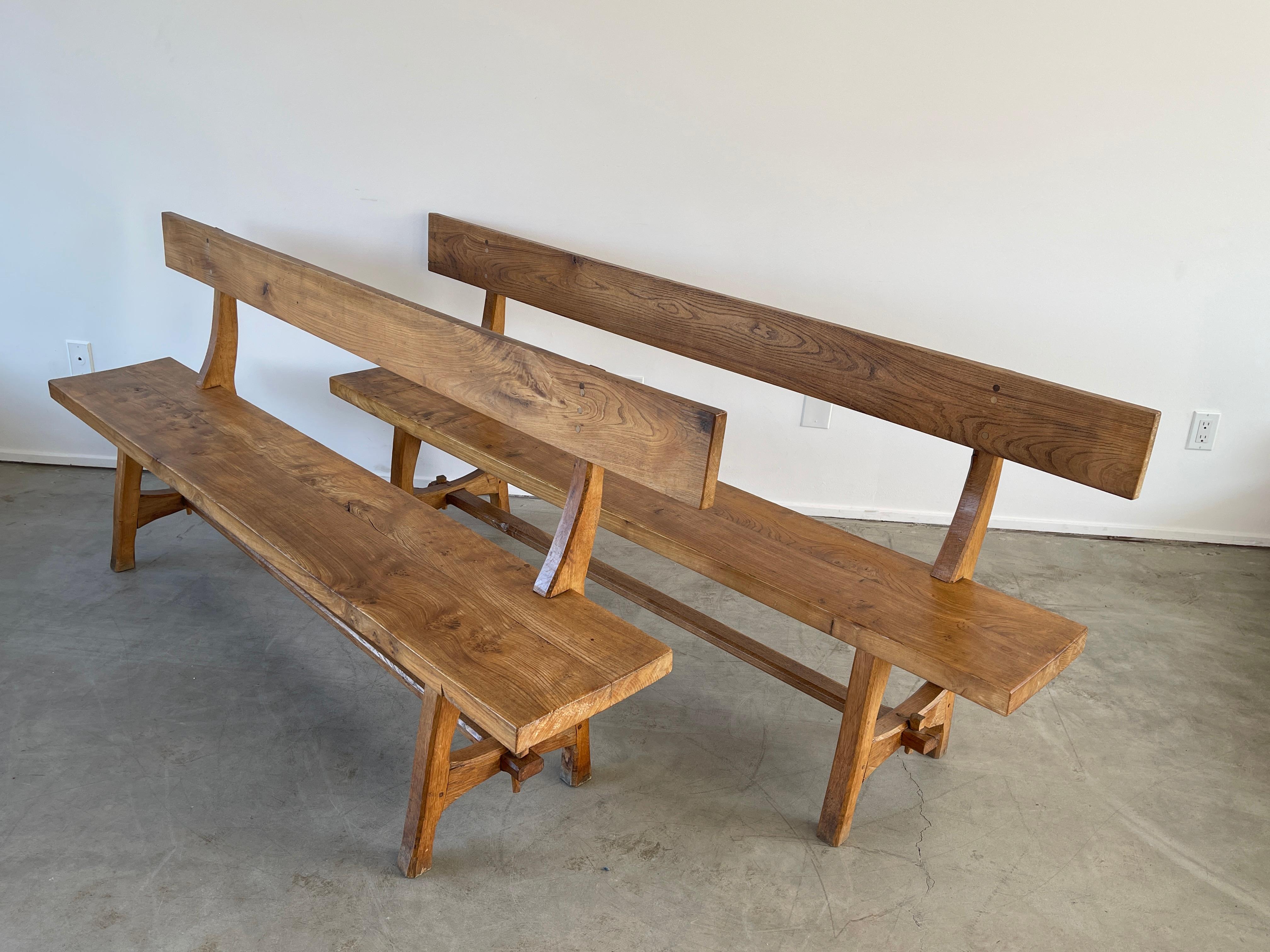 Pair of French oak benches with backs
Great lines / patina to wood 
Priced individually.