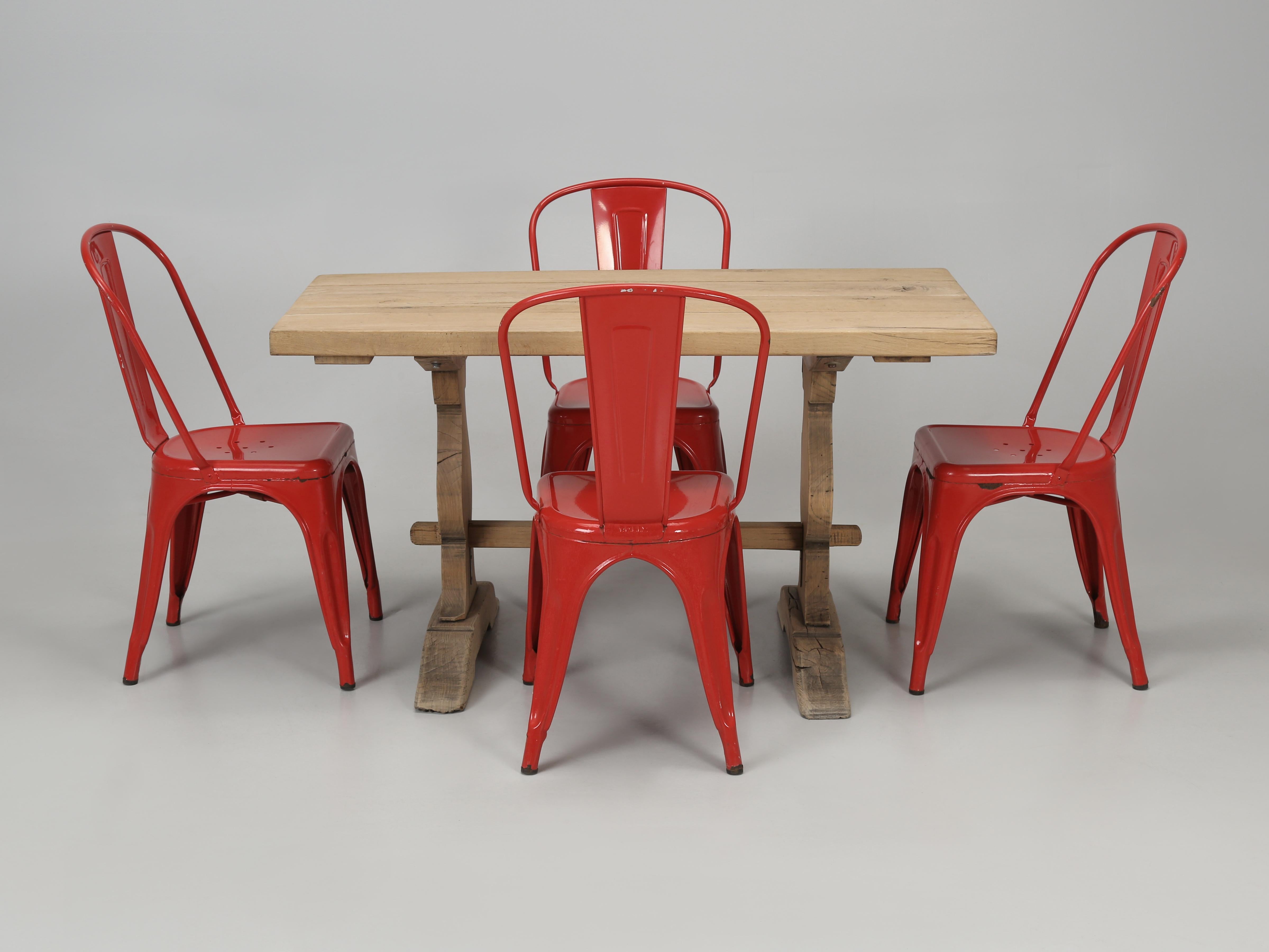 French Bistro table with (4) Authentic Vintage Tolix steel chairs. The Bistro Table was used in a French Bistro for over 100-years, while the Vintage Tolix Steel Stacking Chairs are probably closer to 60-years old. Should you prefer a different