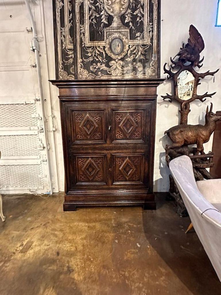 19th century French carved oak 4 door cabinet. Circa 1880. Perfect for today's transitional designs!