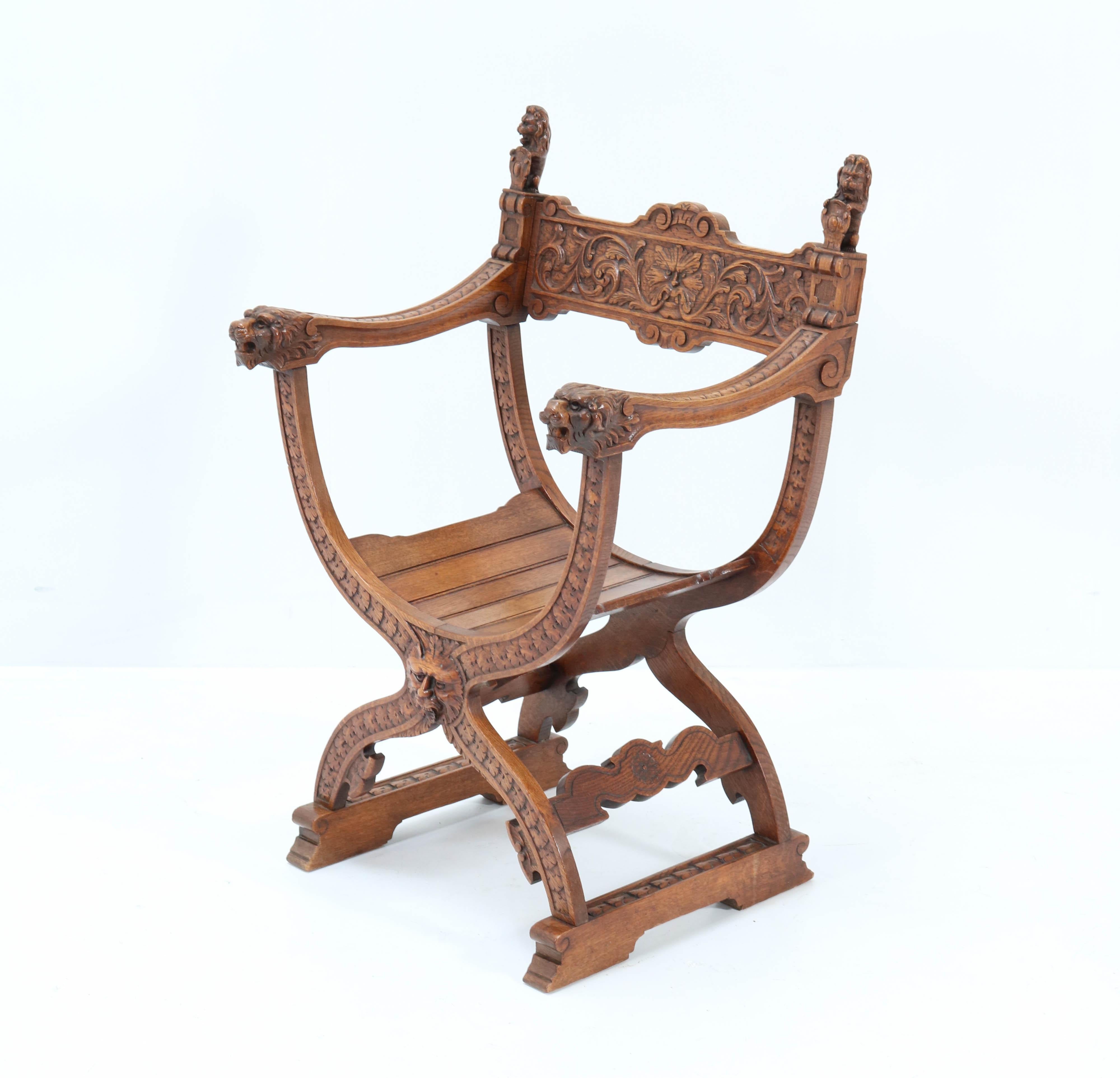 French Oak Carved Curule Chair Arm Throne Neo Renaissance Dagobert, 1920s In Good Condition In Amsterdam, NL