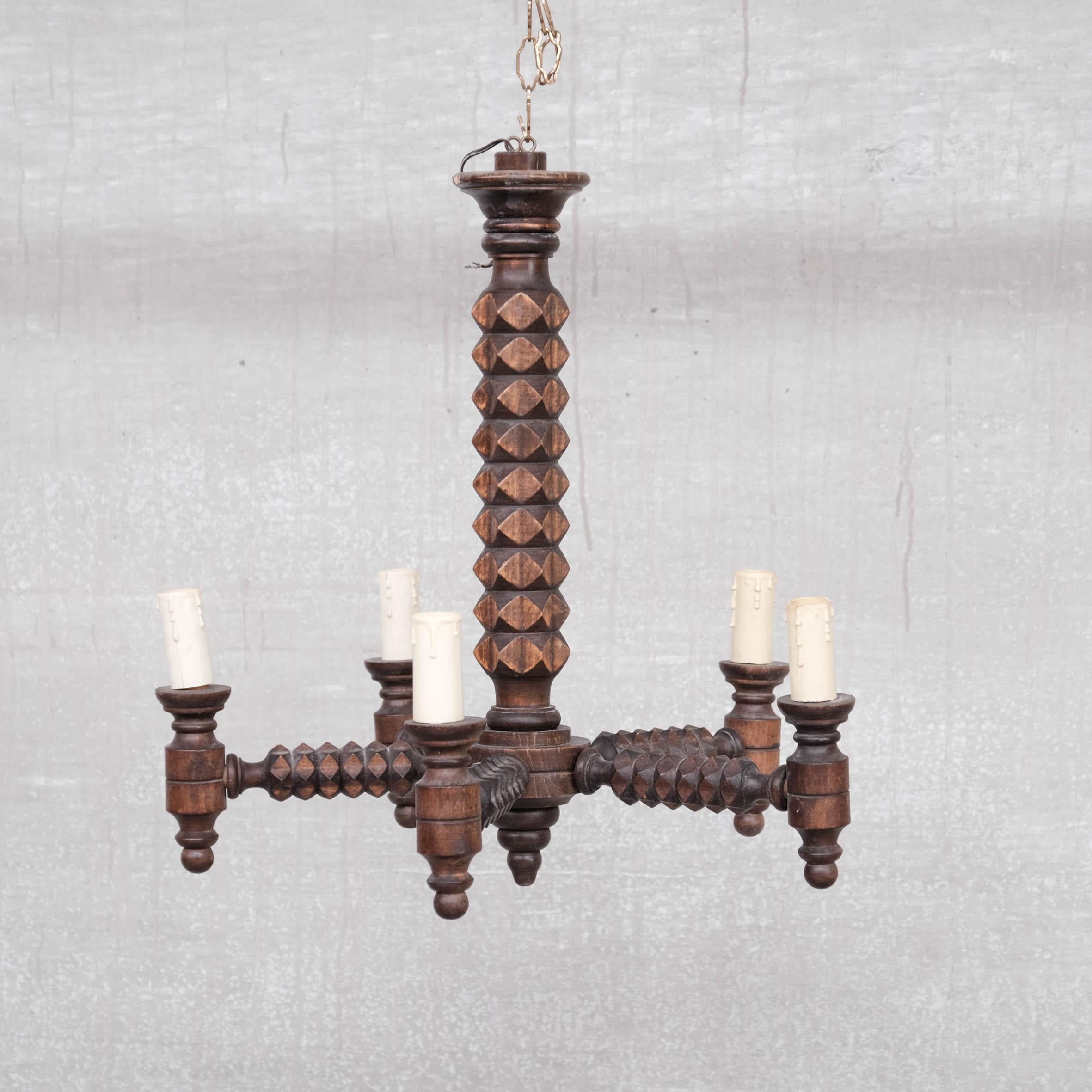 Wooden turned and carved oak chandeliers. 

France, c1930s. 

In the style of Dudouyt. 

Priced and sold individually.

Two available at the time of listing. 

Good vintage condition, some scuffs and wear commensurate with age.