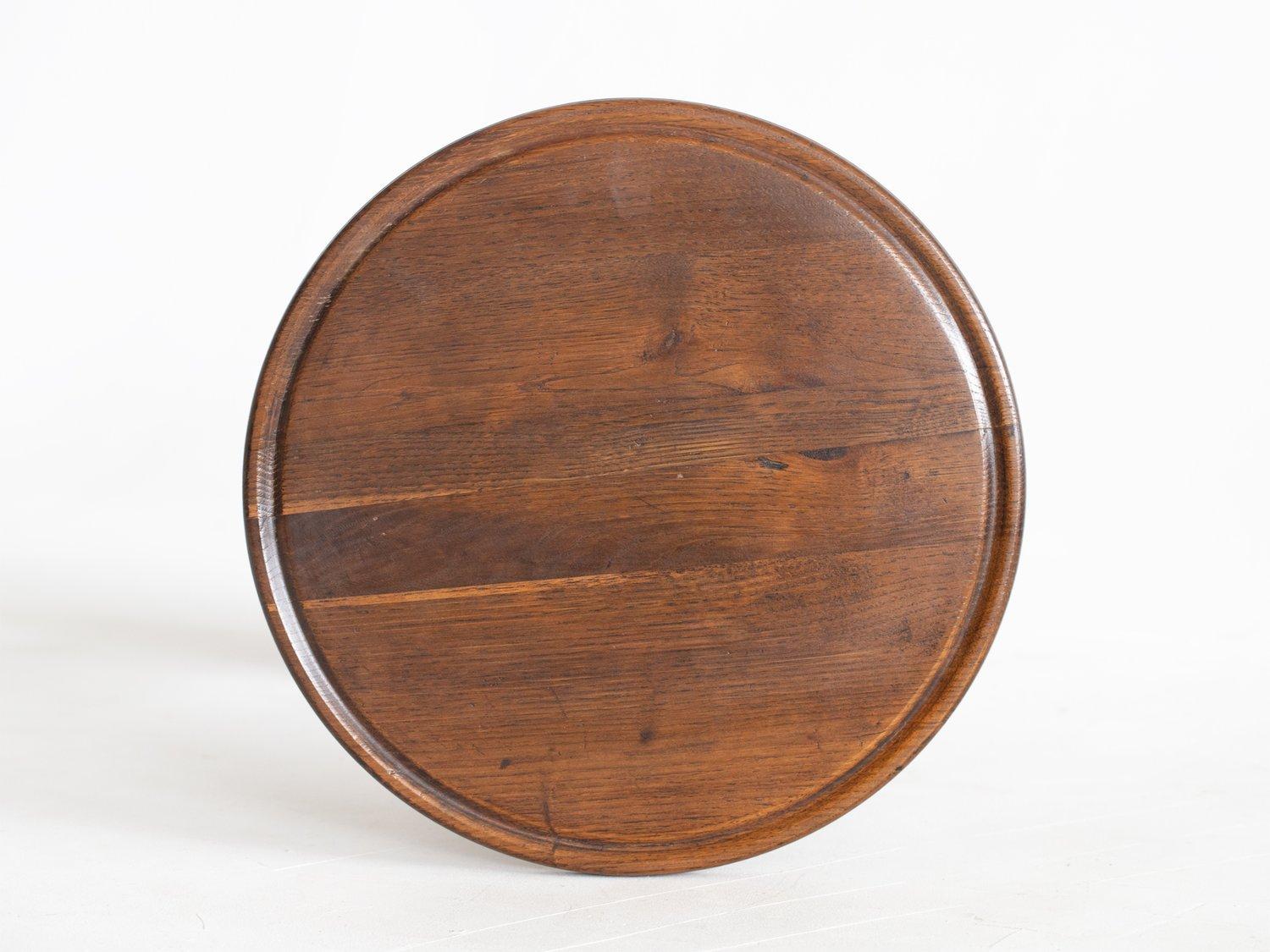 Mid-Century Modern French oak circular occasional side table in the manner of Charles Dudouyt For Sale