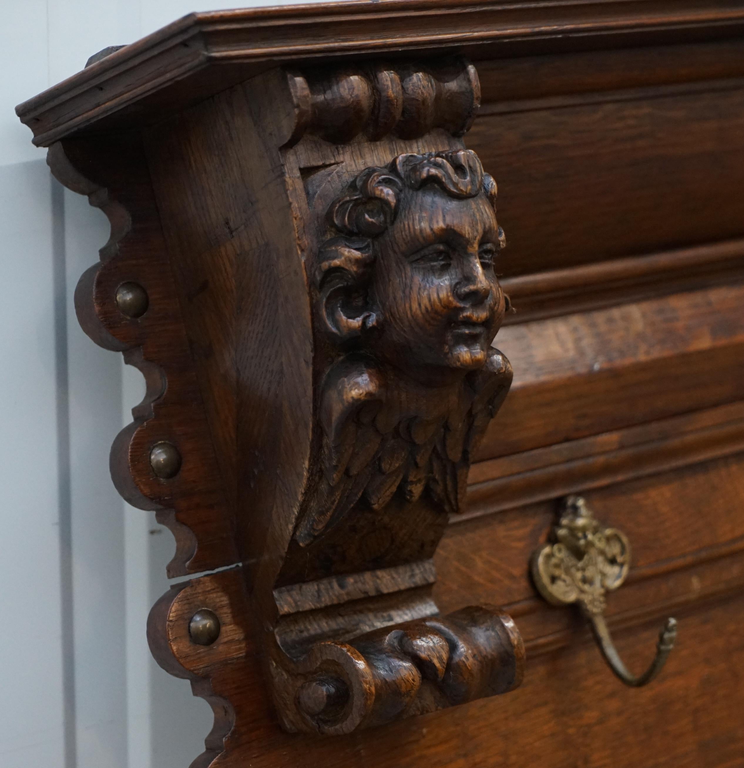 Victorian French Oak Coat or Utensil Rack Wall Mounted Winged Cherubs Carvings, circa 1840