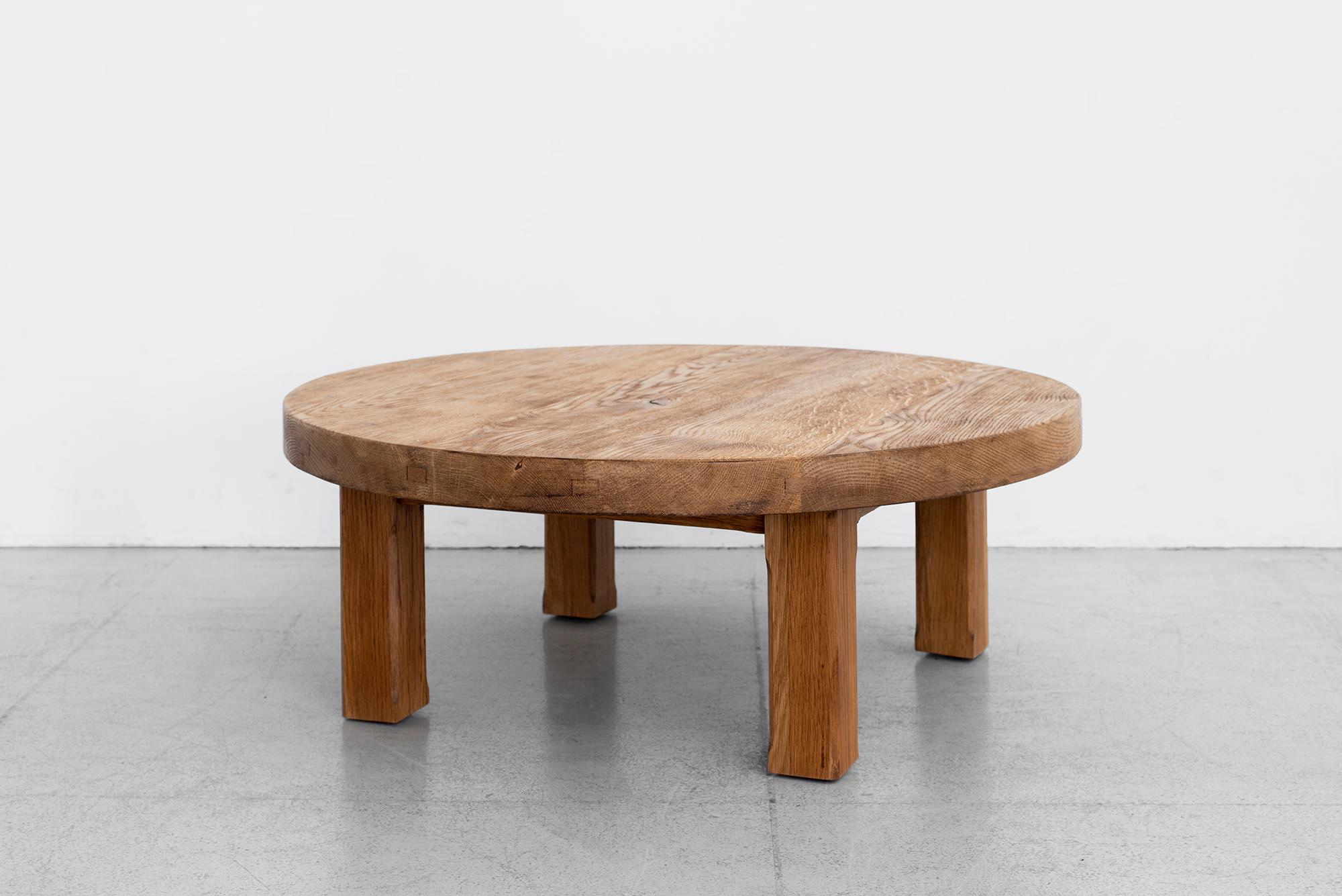 Solid French oak coffee table with thick slab top that has wonderful grain and patina.
Unique squared off legs.
French, circa 1950s - In the vein of Charlotte Perriand.