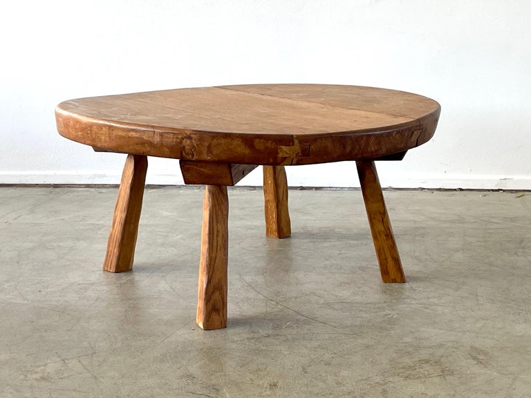 The perfectly patina'd French oak coffee table 
Thick oak planks with butterfly joints 
Wonderful wear and irregular Wabi Sabi circular shape.
 