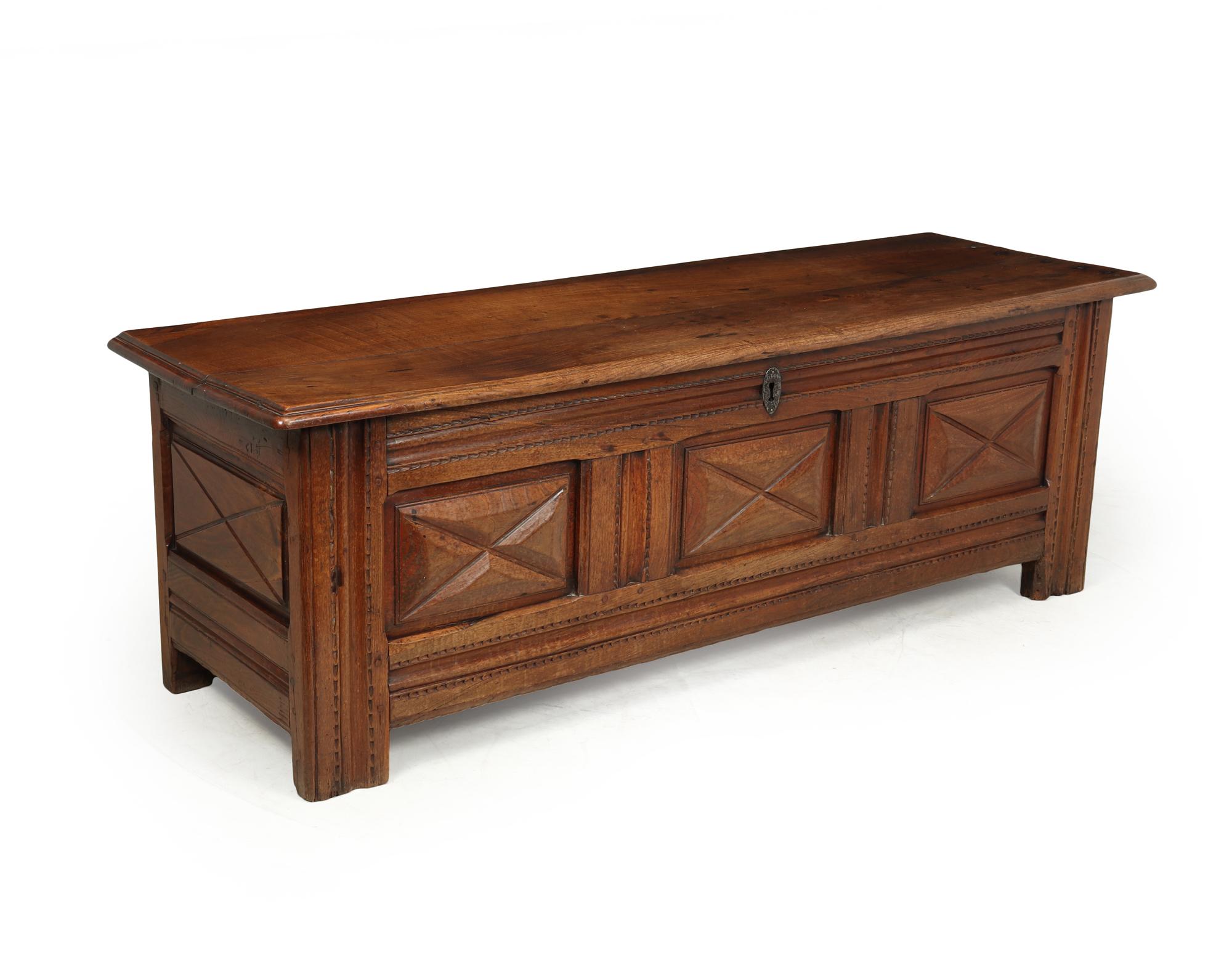 A French 19th century sold oak coffer or blanket box ideal for the foot of a five foot bed, with paneled front and sides, lock missing and non original hinges in good condition having age related wear and waxed finish, with great colour and