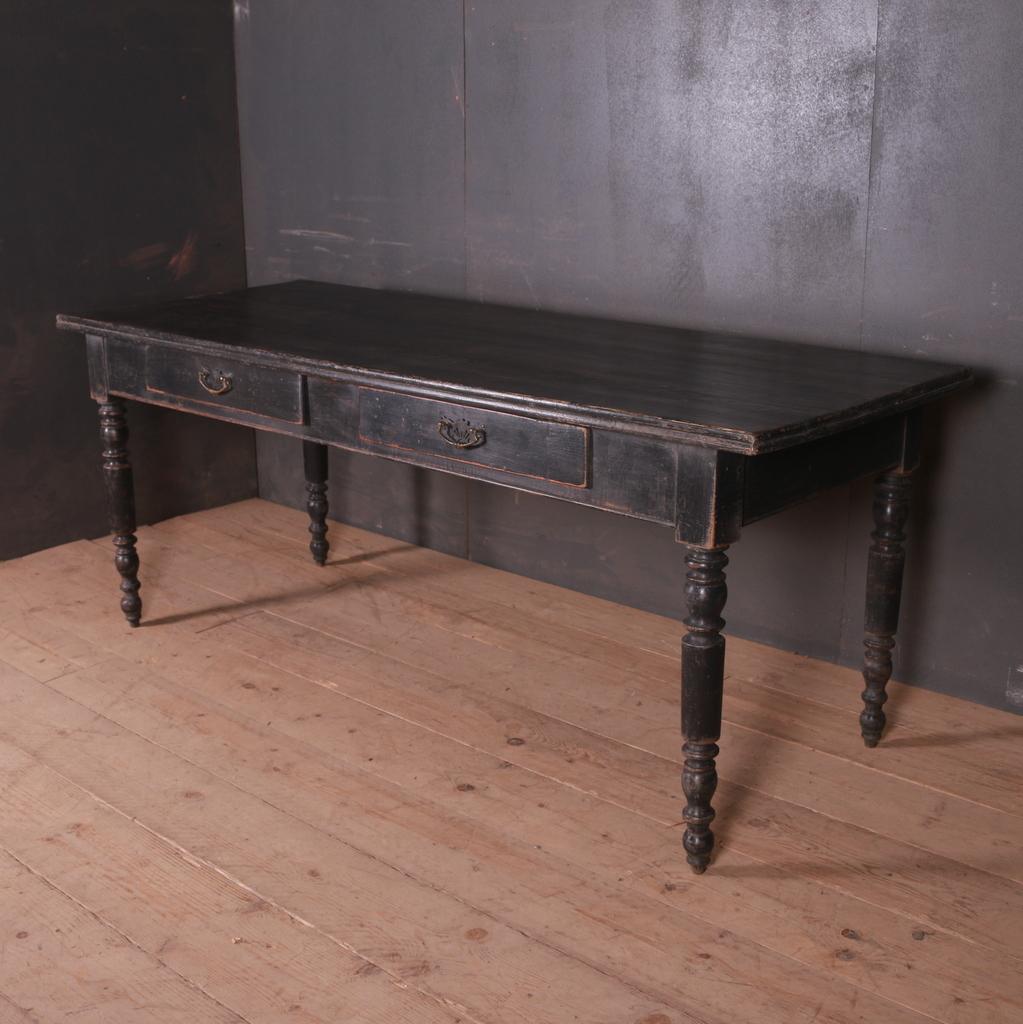 19th century French two-drawer writing table/ desk, 1860.

Dimensions:
79 inches (201 cms) wide
30.5 inches (77 cms) deep
32 inches (81 cms) high
Height under rails 25