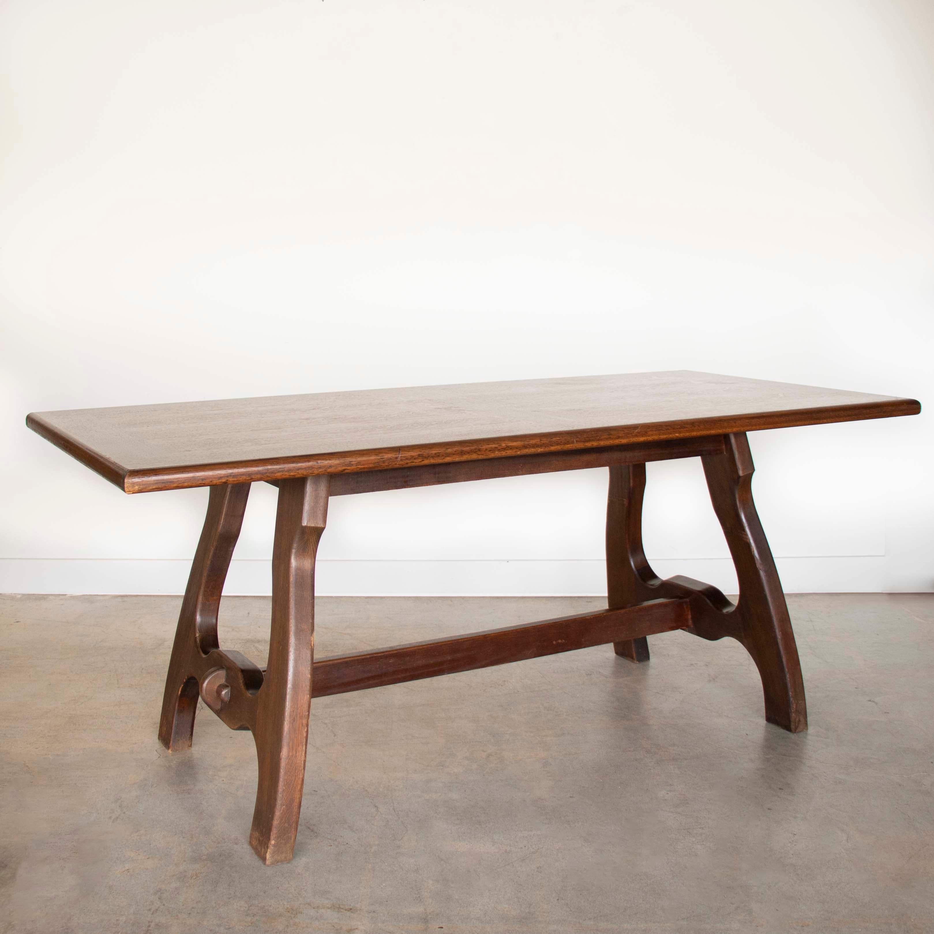 Incredible and rare table by Robert Guillerme and Jacques Chambron from France, 1950's.  Rectangular top with curved wood legs and wood joint details on base. Solid table in original condition that has not been refinished. Shows signs of vintage