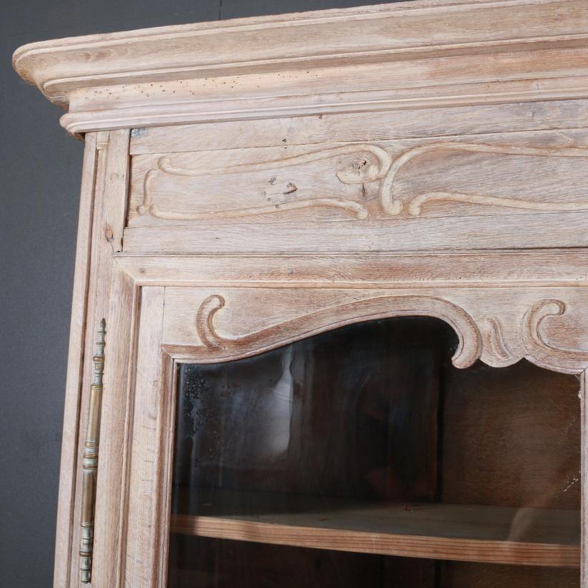 Early 19th century, French bleached oak display cabinet, 1810.

Internal depth - 12
