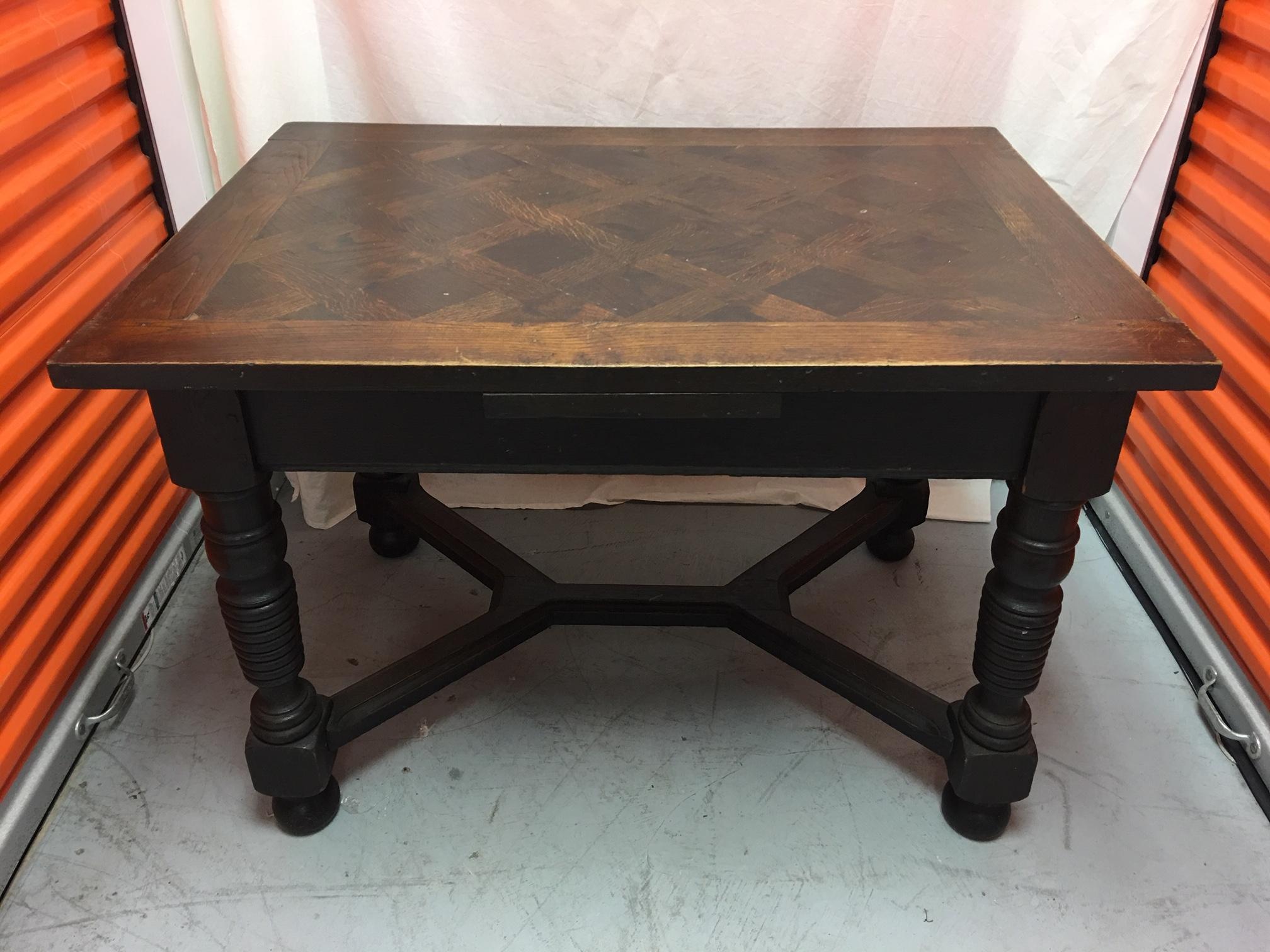 French oak draw table with a parquet top, late 19th century.