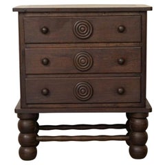 Commode en chêne français par Charles Dudouyt